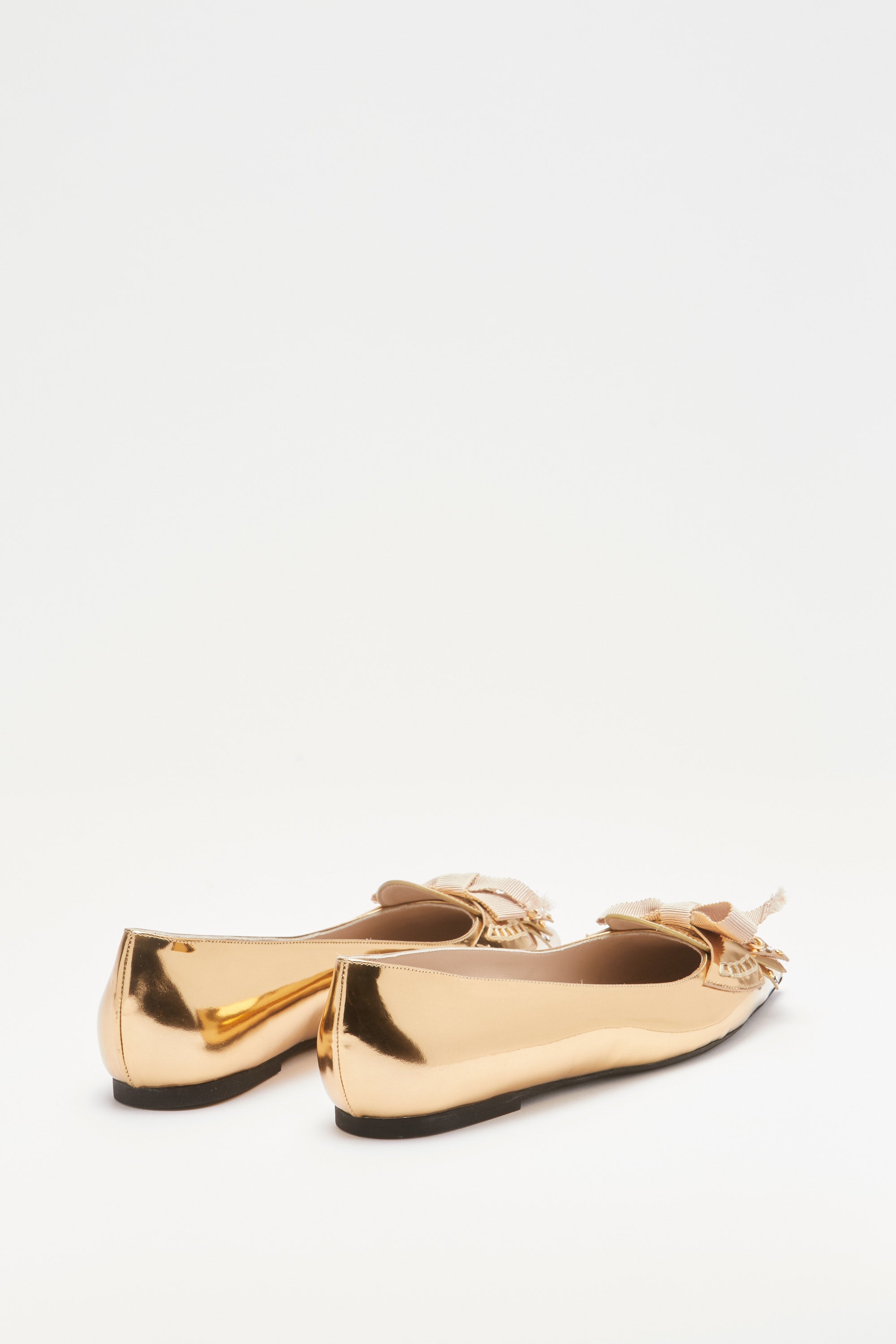 Pointed ballerinas with fringes and studs