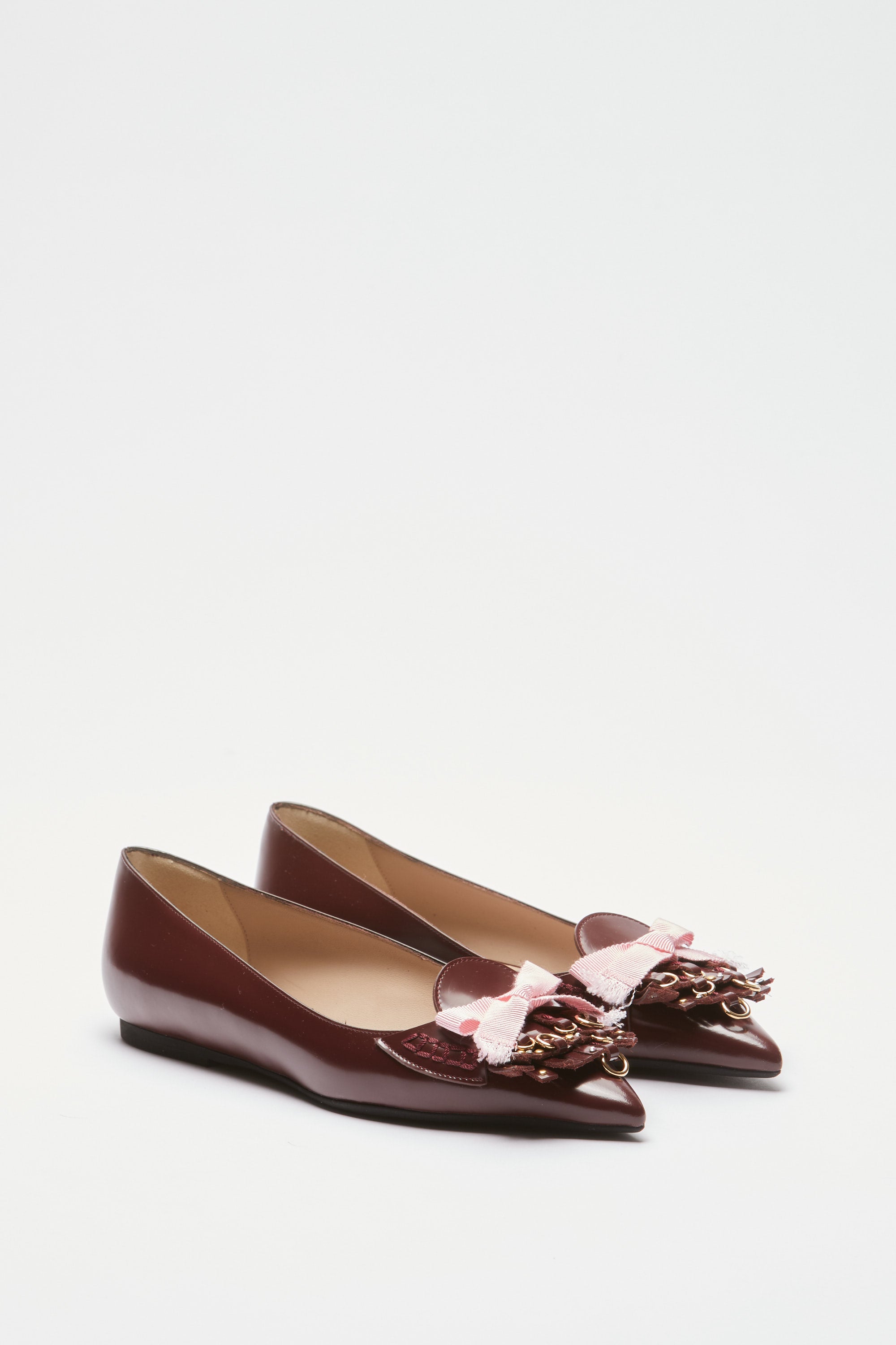 Pointed ballerinas with fringes and studs