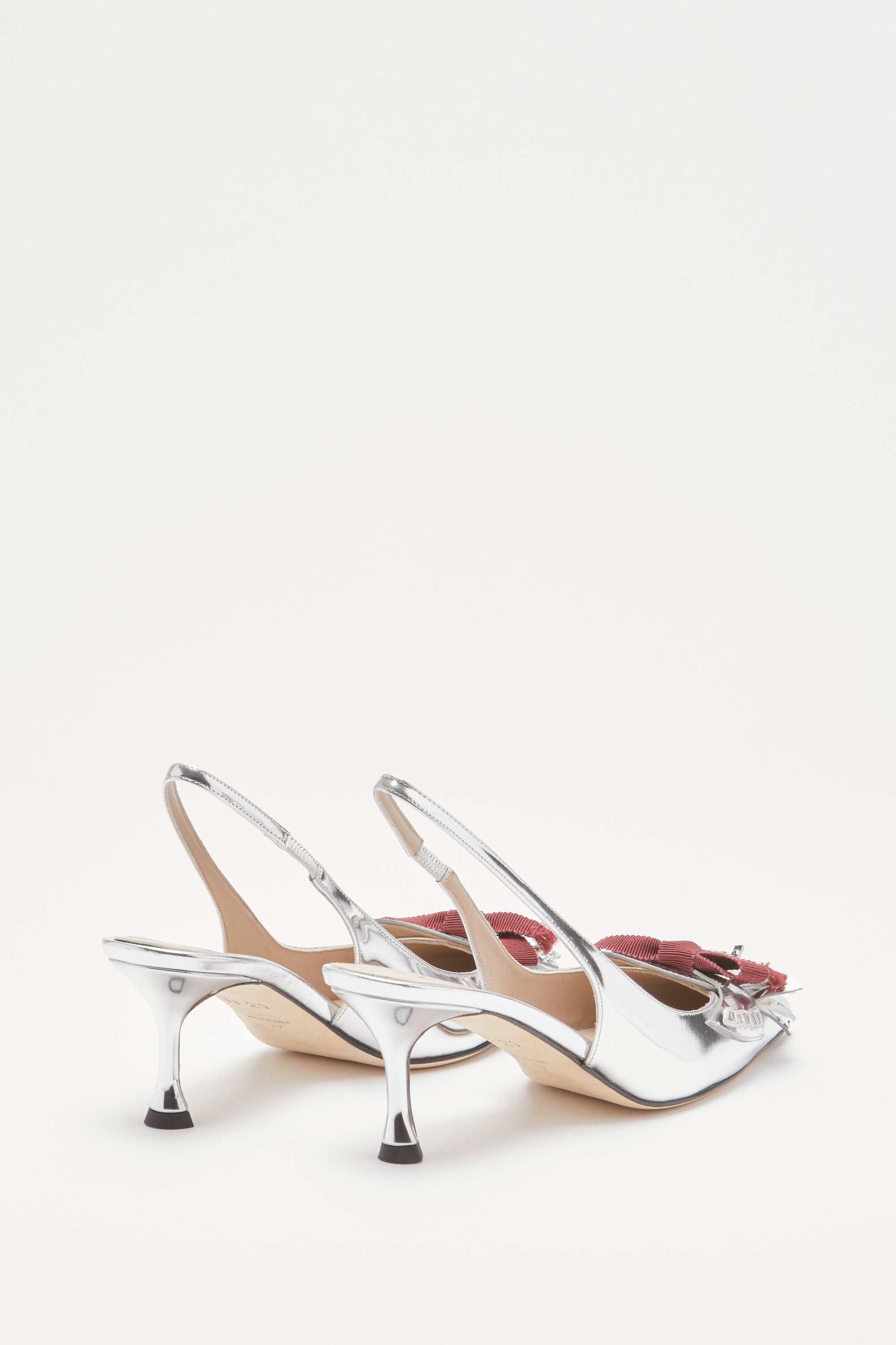 Slingback with fringes and studs
