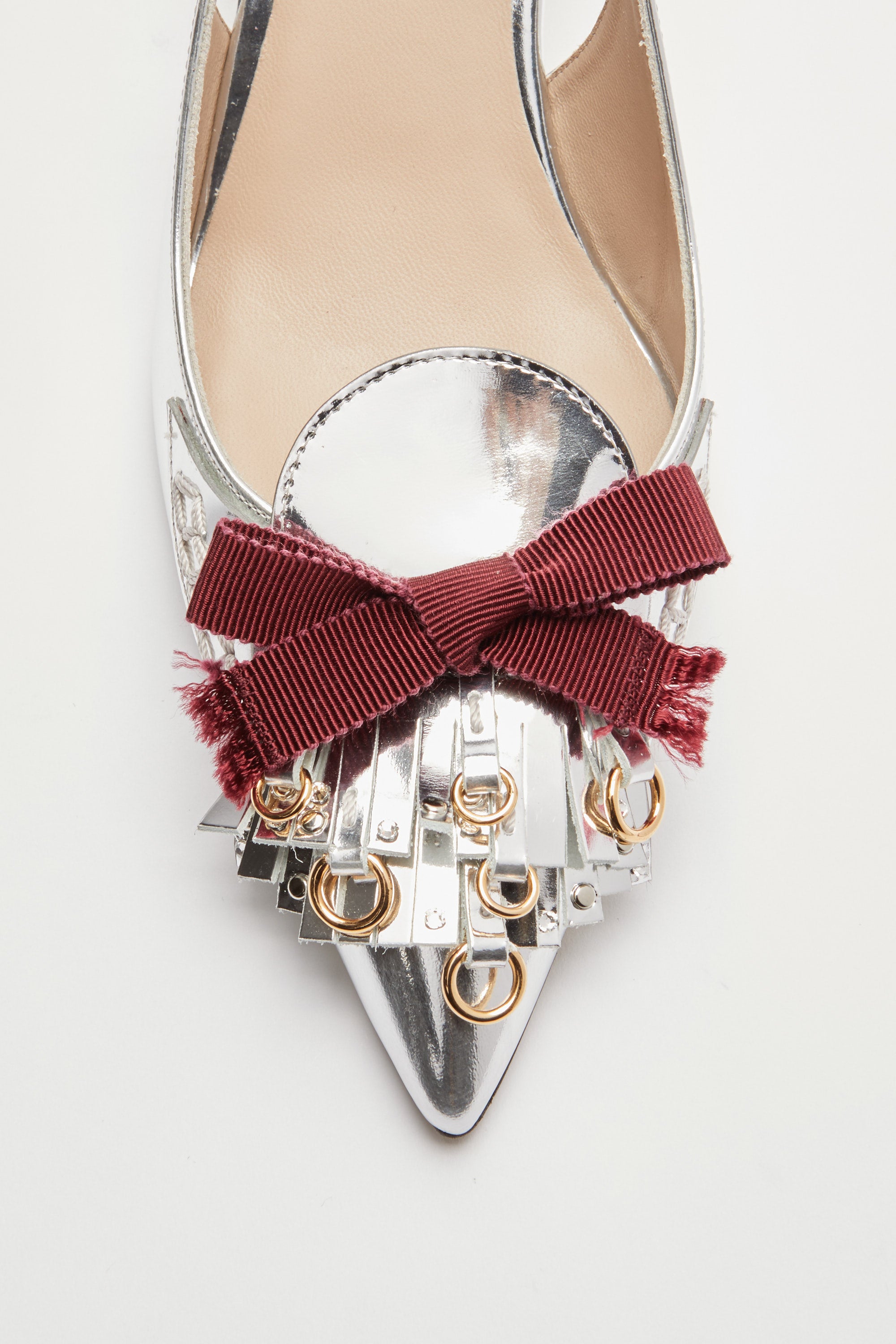 Slingback with fringes and studs