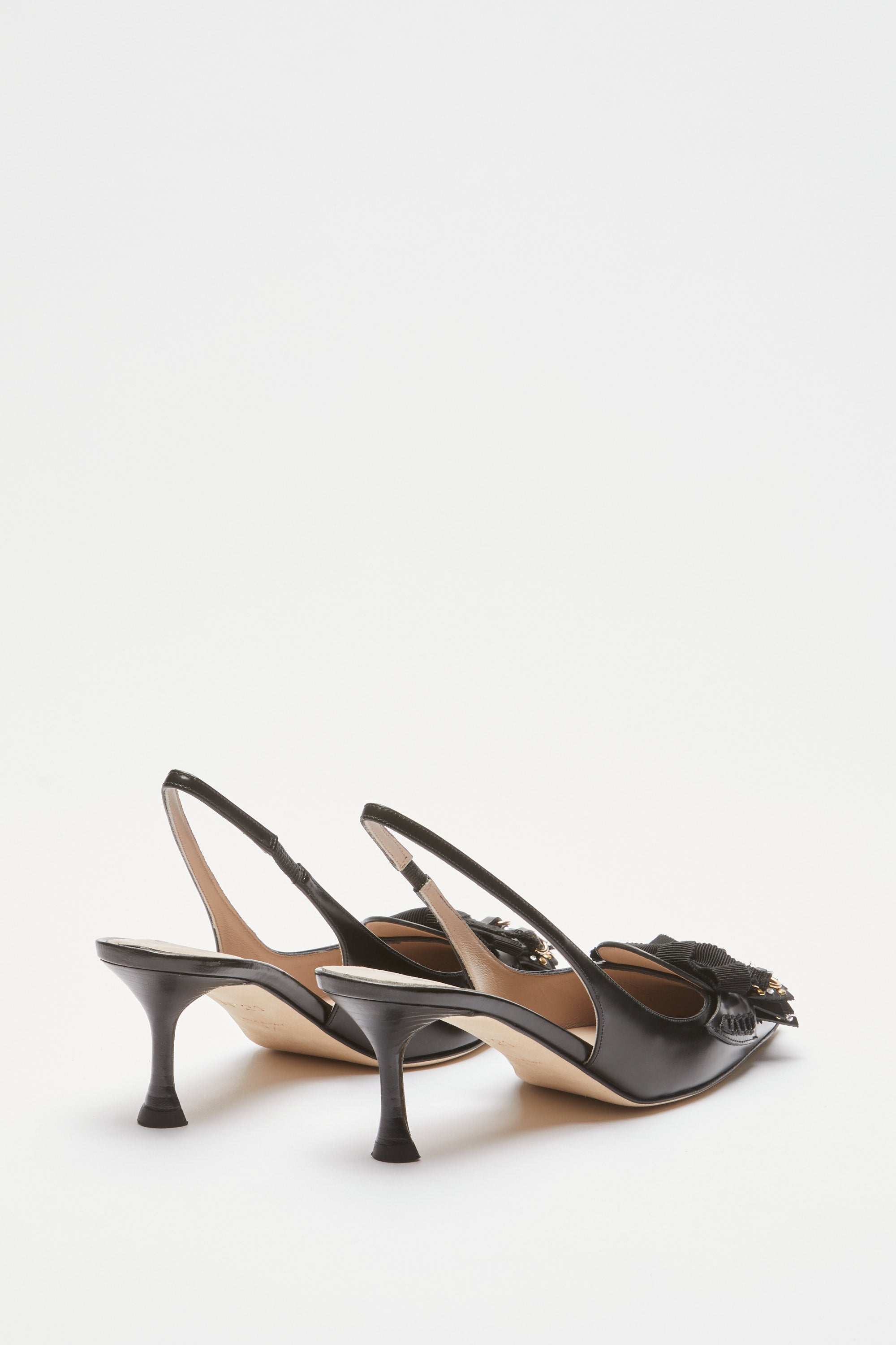 Slingback with fringes and studs