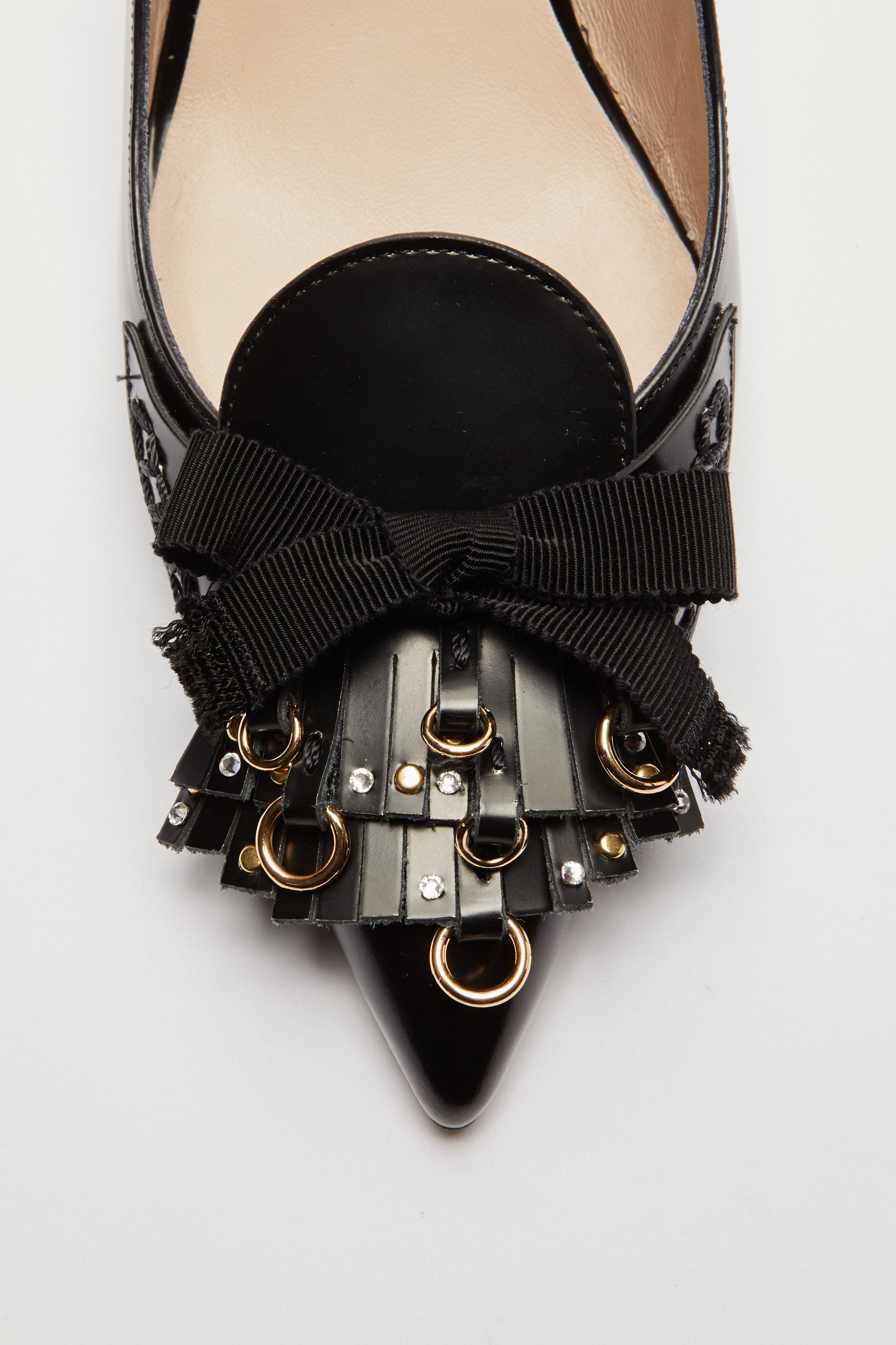 Slingback with fringes and studs