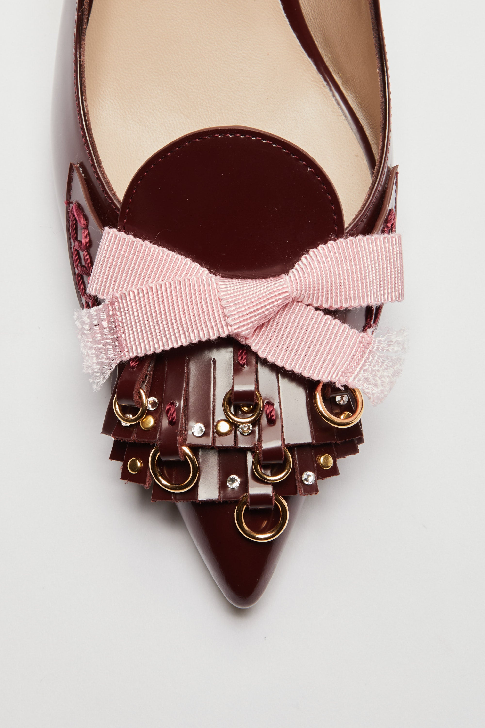 Slingback with fringes and studs