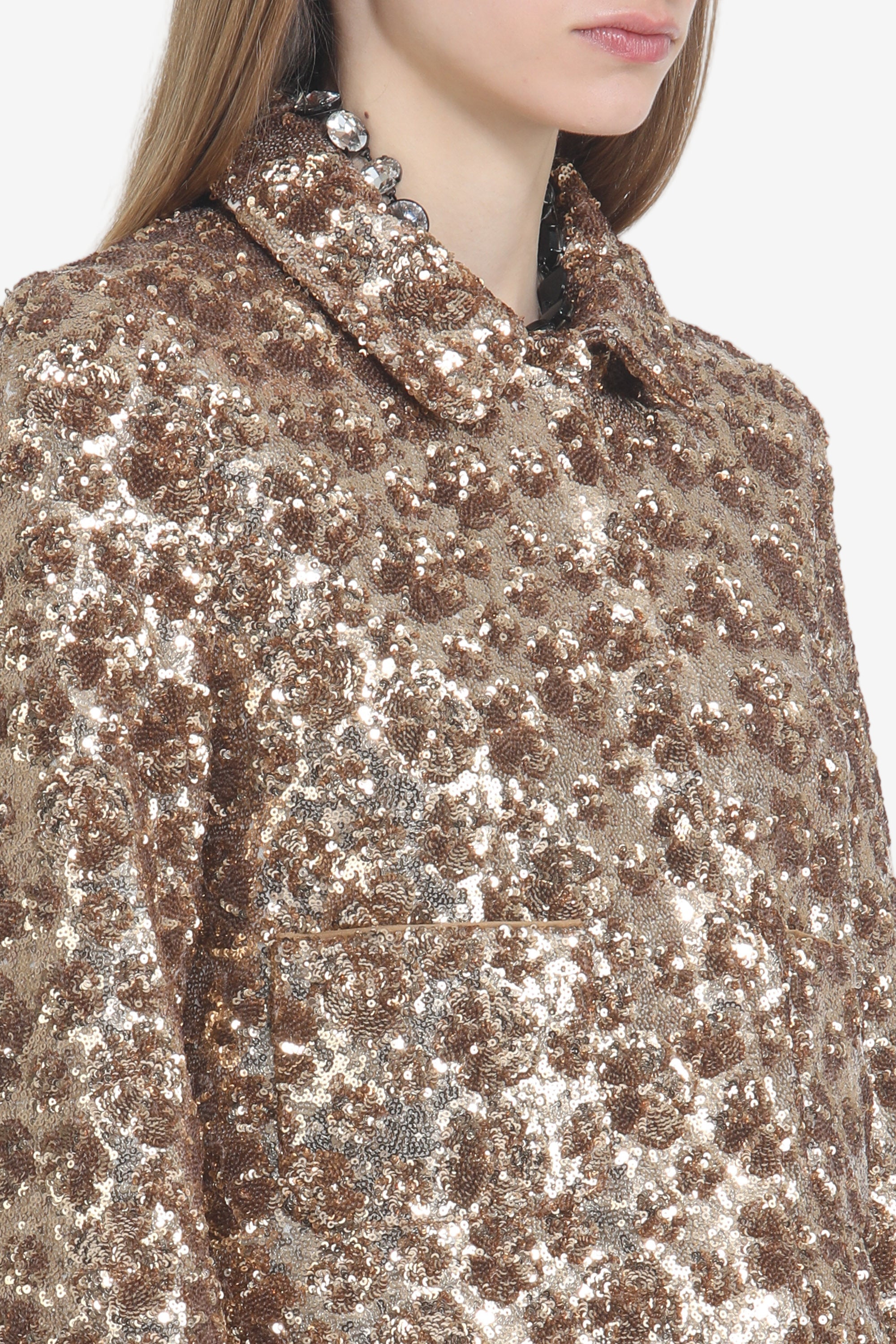 Short jacket with sequined fabric and pockets