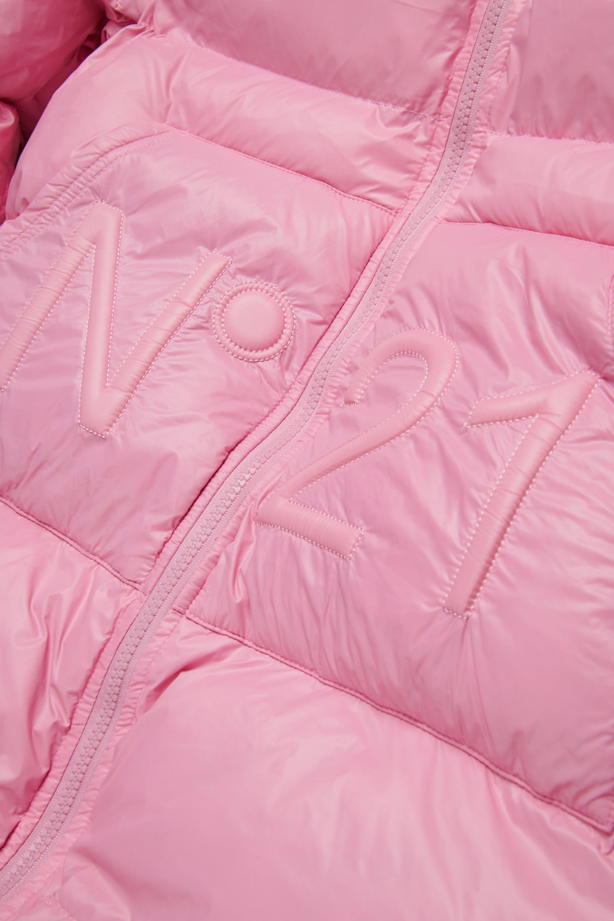 Long padded jacket with asymmetrical hem