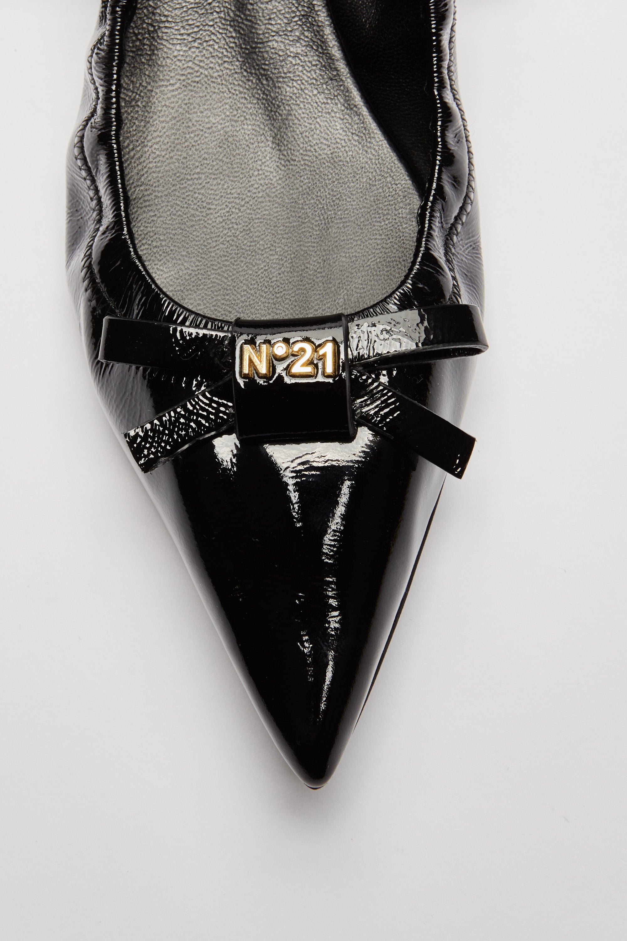 Pointed toe ballerinas with bow and logo