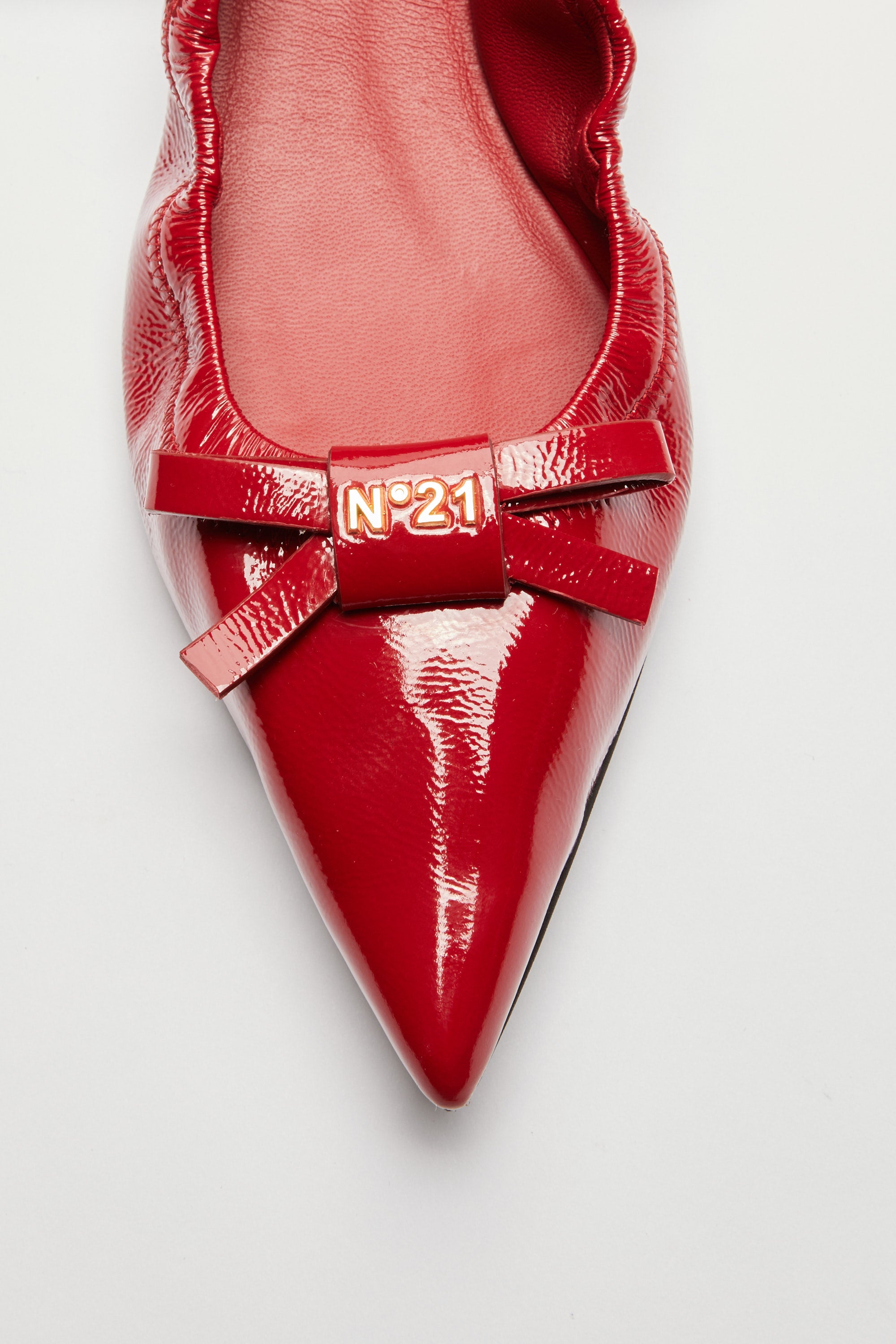 Pointed toe ballerinas with bow and logo
