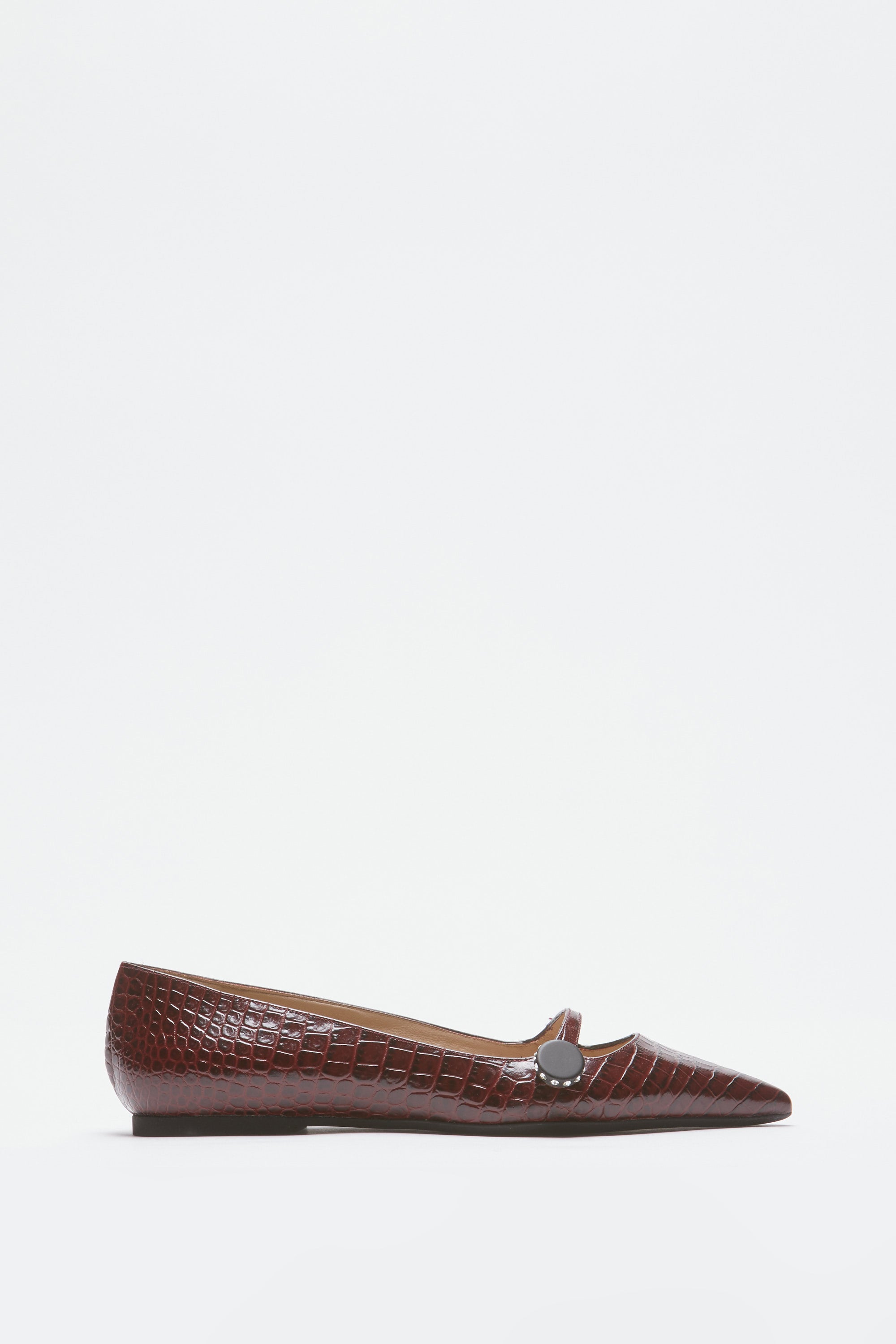 Pointed-toe ballerinas in crocodile print