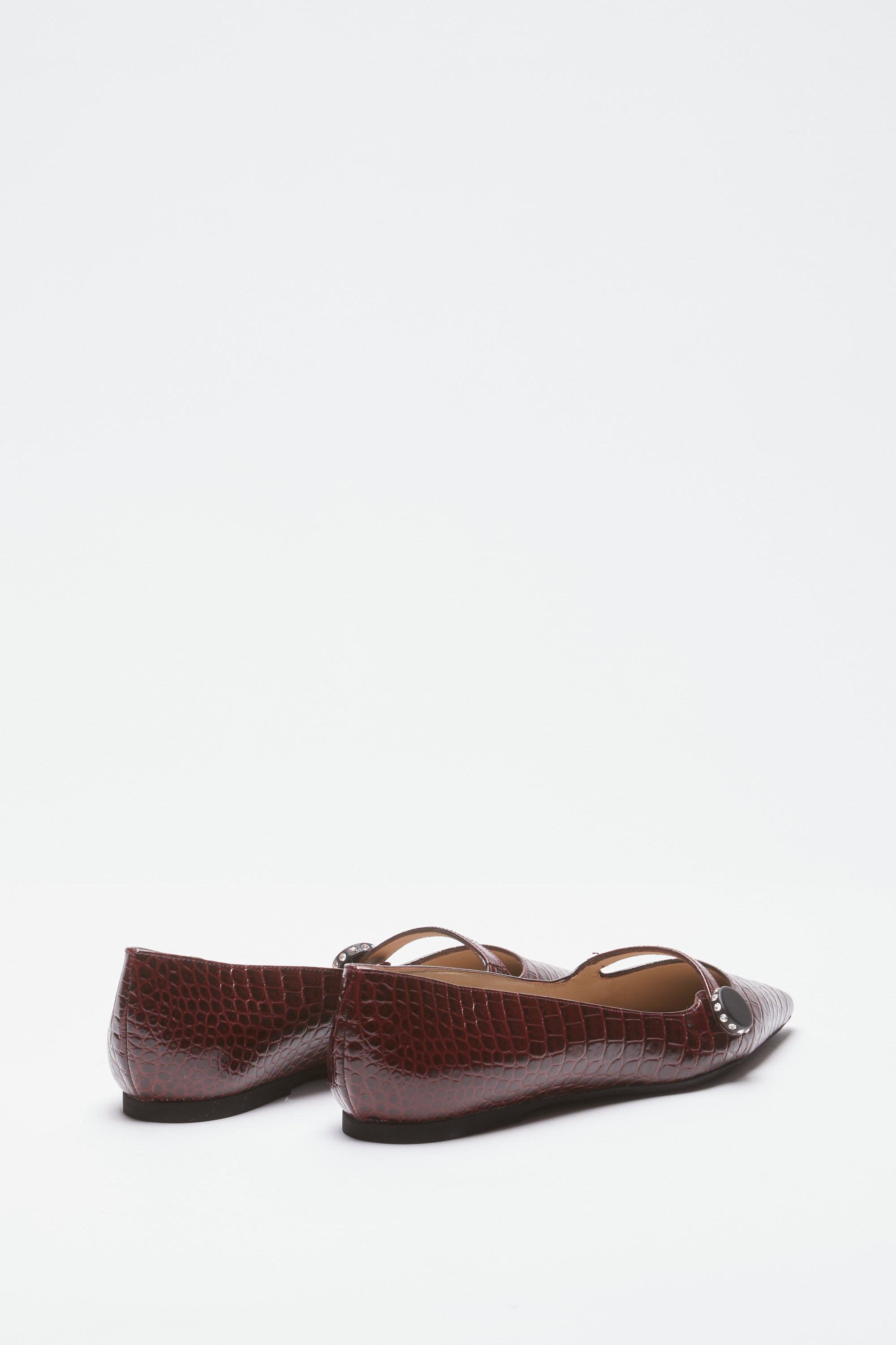 Pointed-toe ballerinas in crocodile print