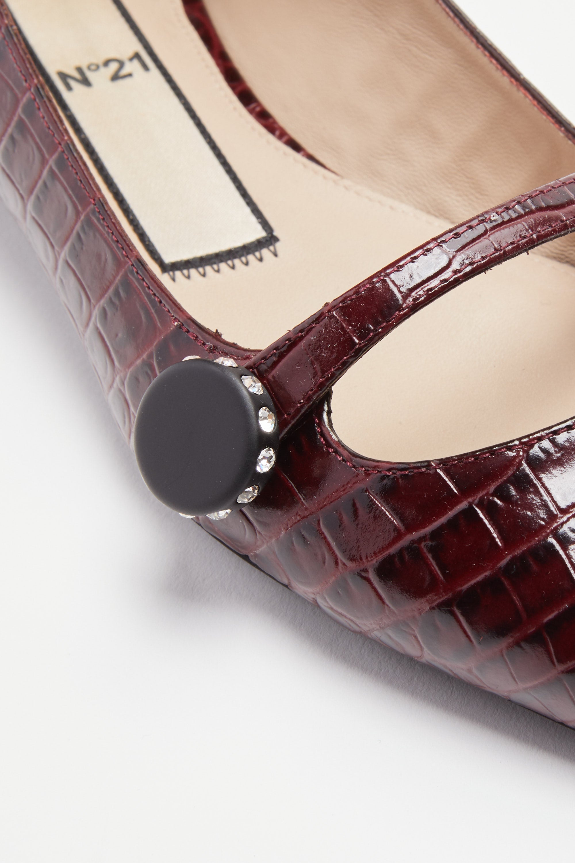 Pointed-toe ballerinas in crocodile print