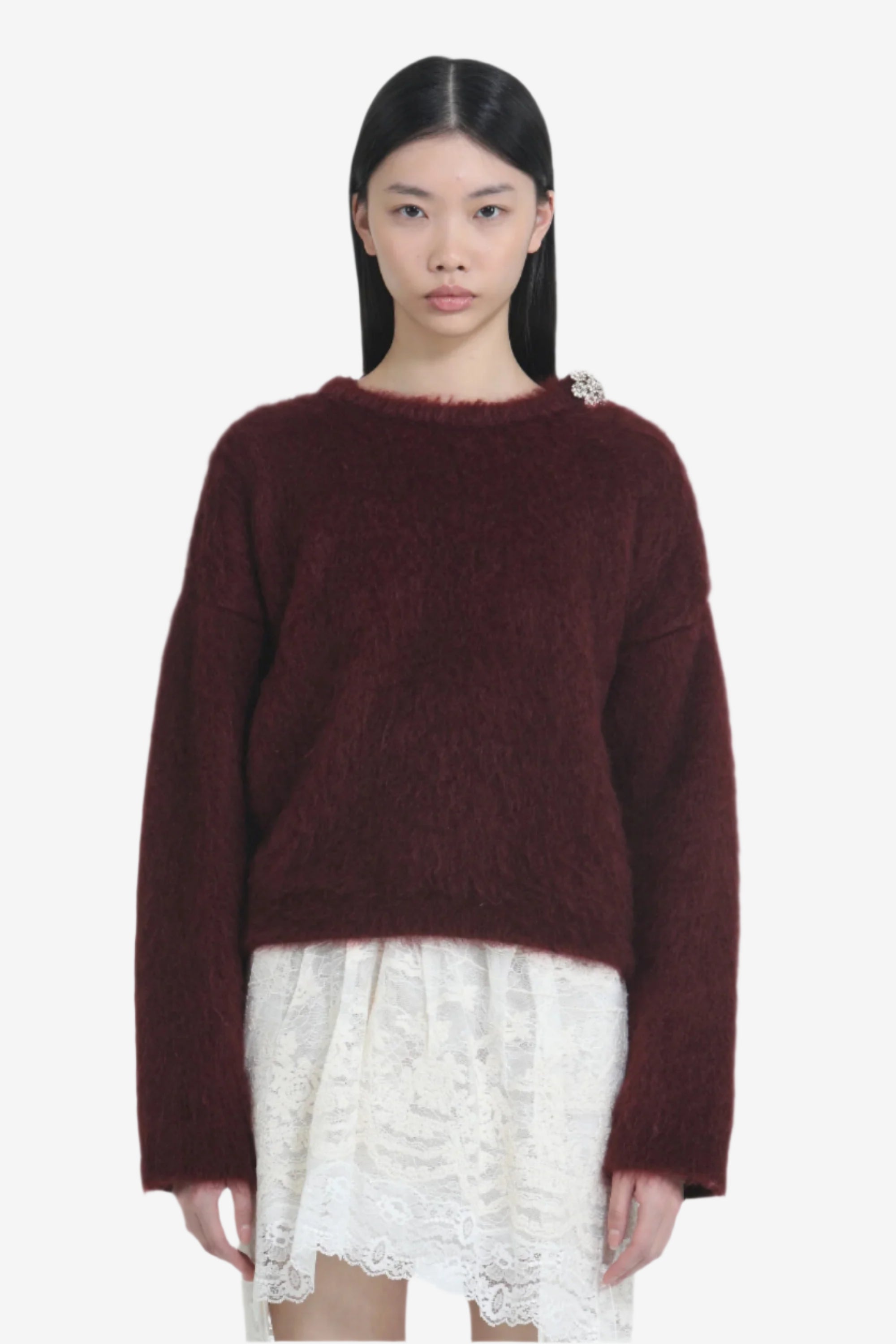 Maglione con bottone gioiello a fiore
