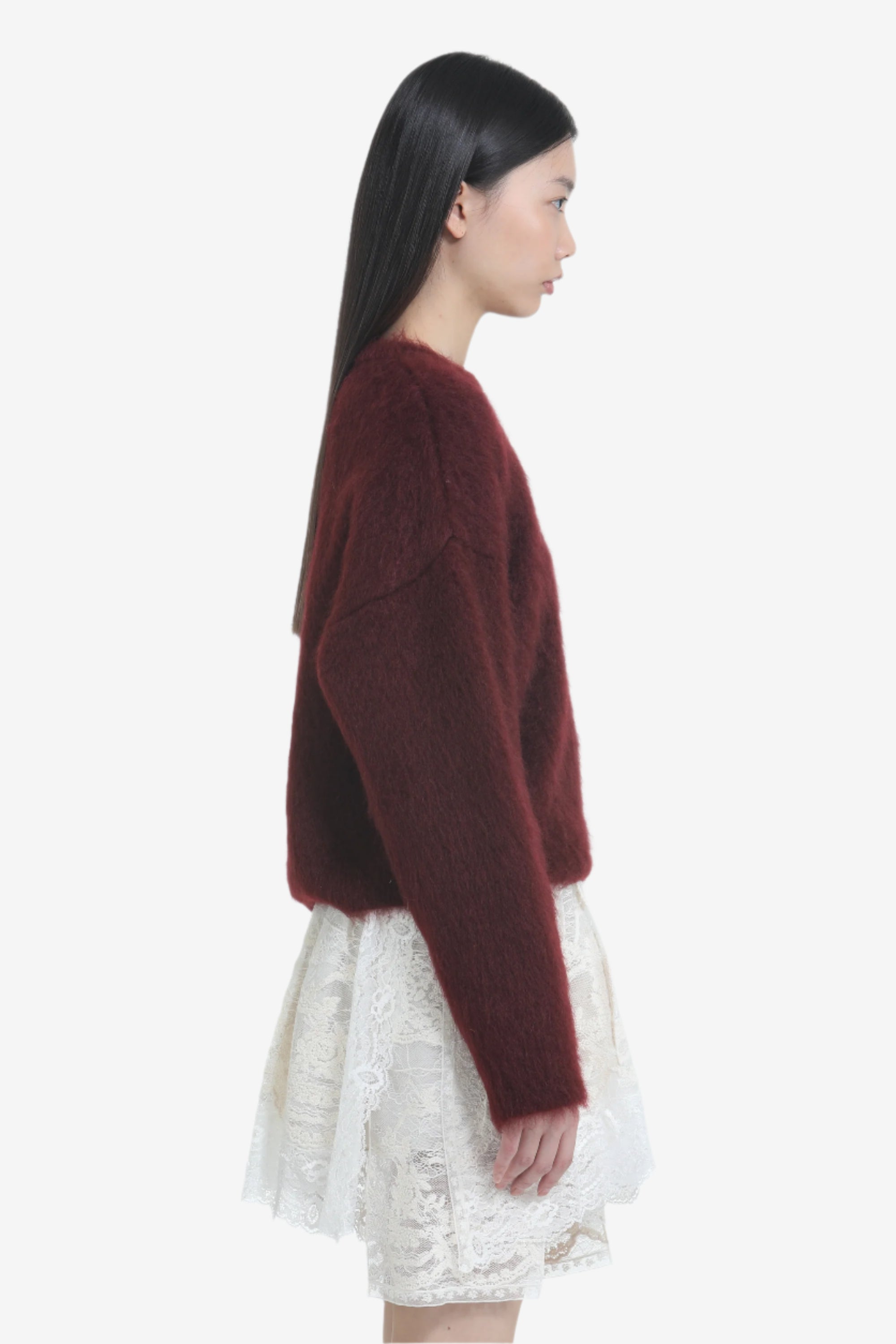 Maglione con bottone gioiello a fiore