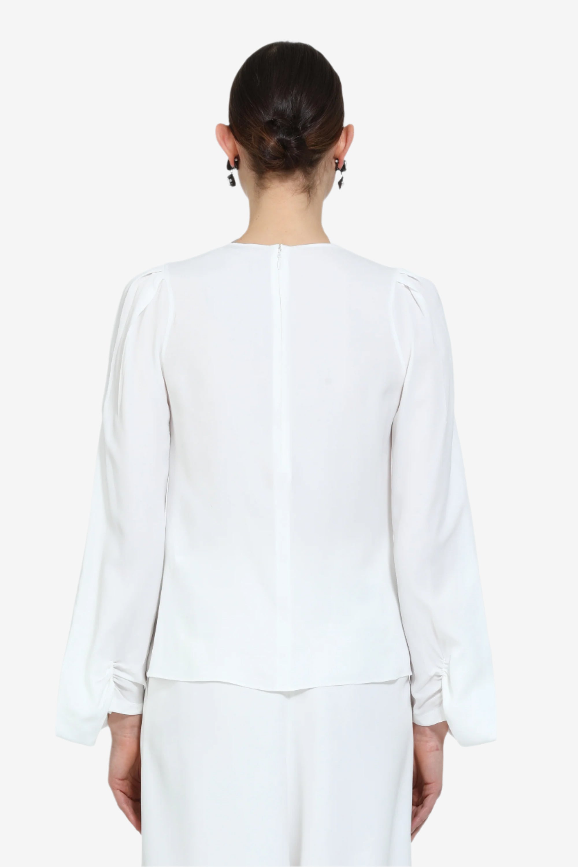 Blusa con maniche lunghe svasate