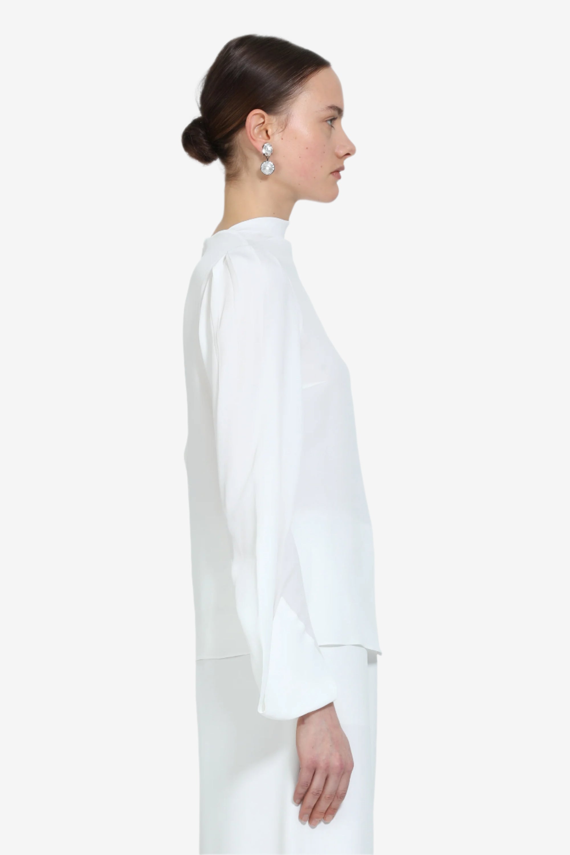 Blusa con maniche lunghe svasate