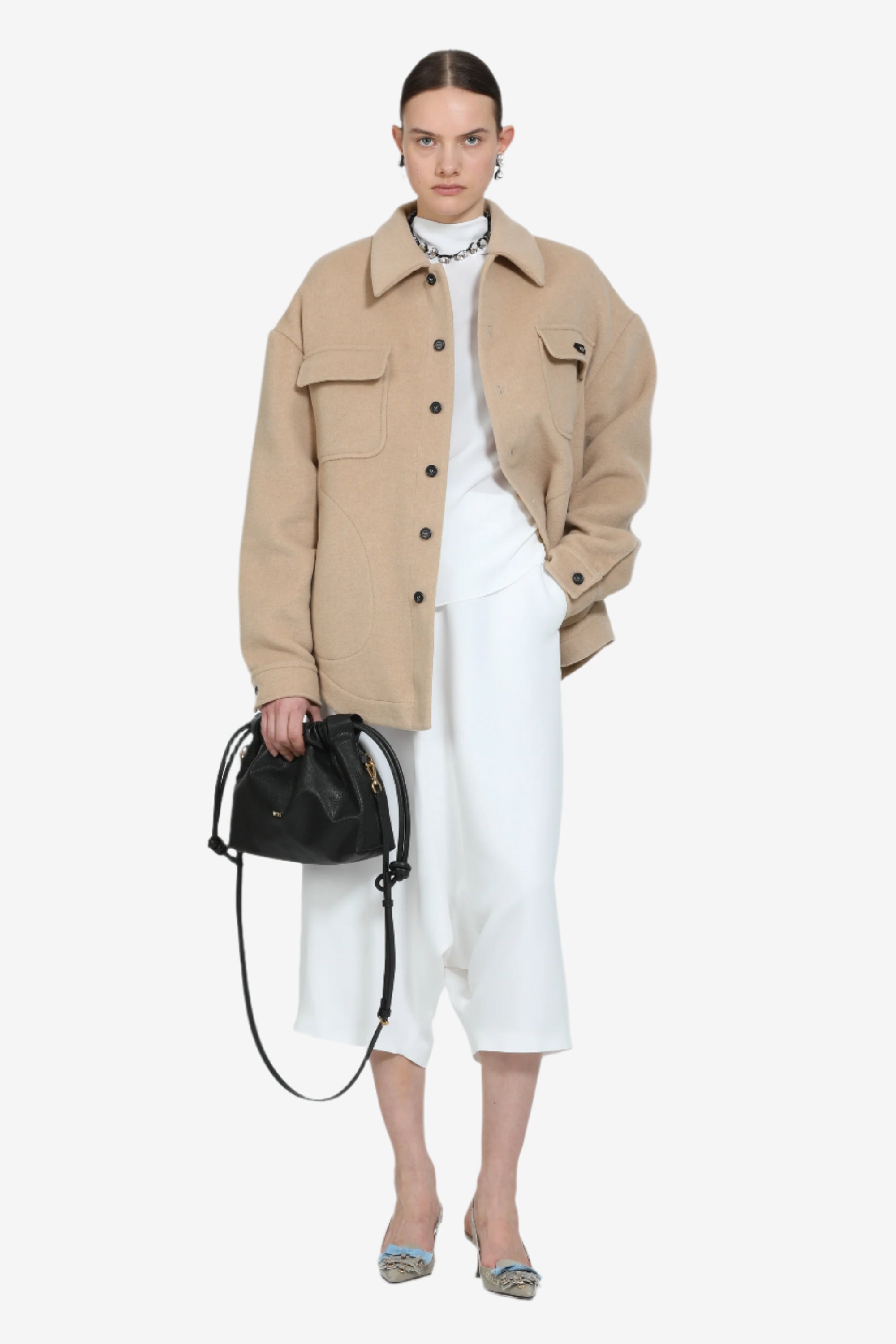 Blusa con maniche lunghe svasate