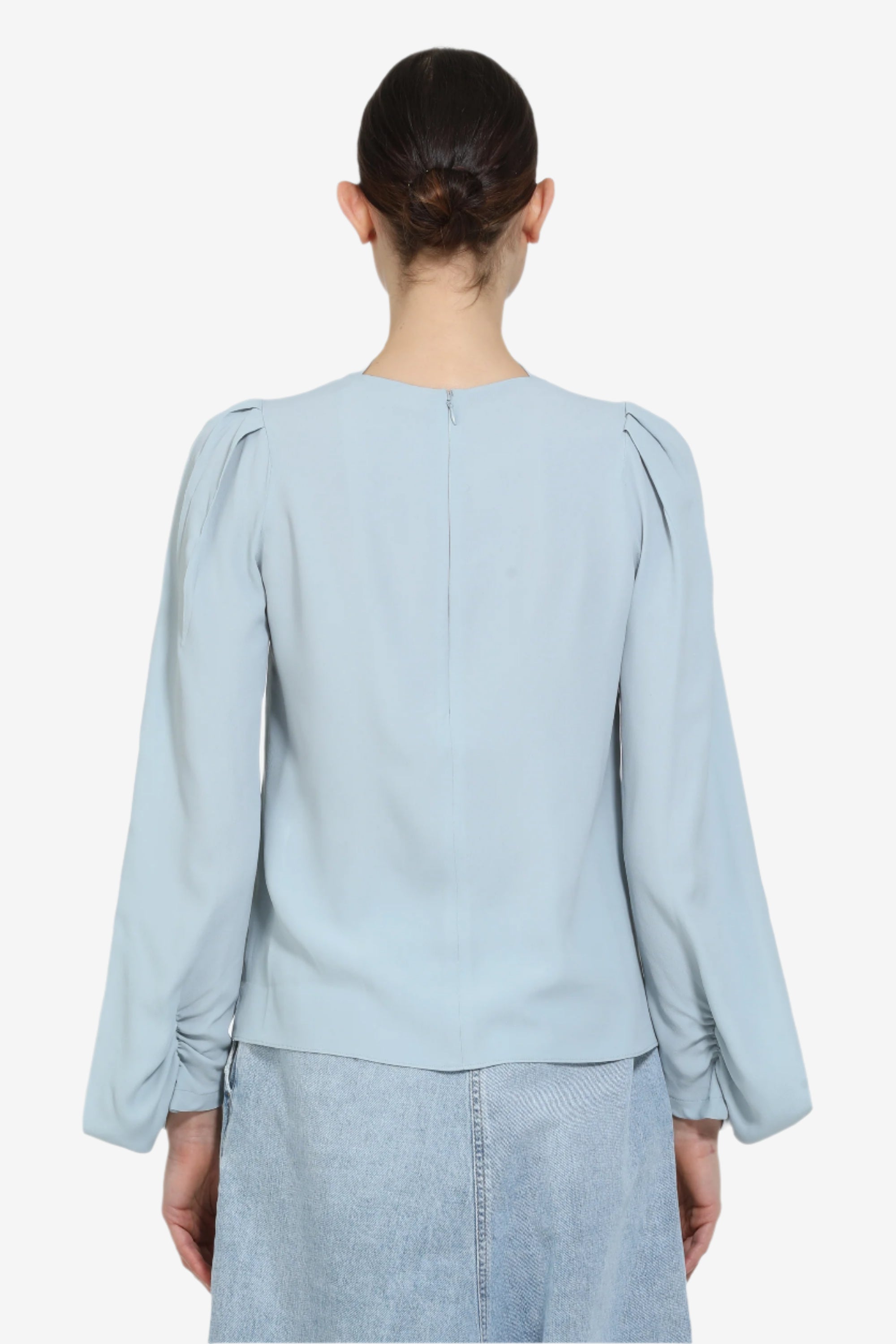 Blusa con maniche lunghe svasate