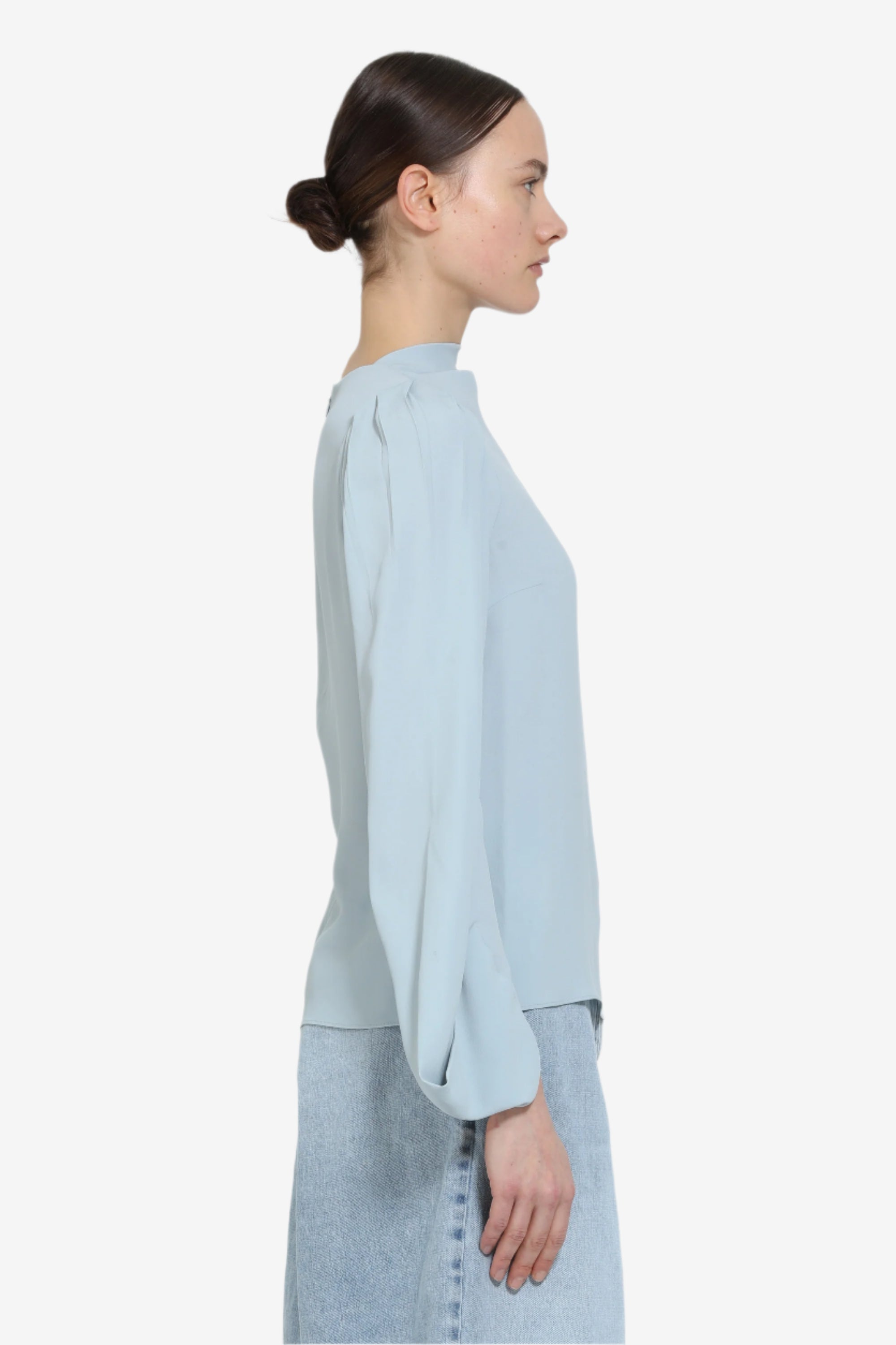 Blusa con maniche lunghe svasate