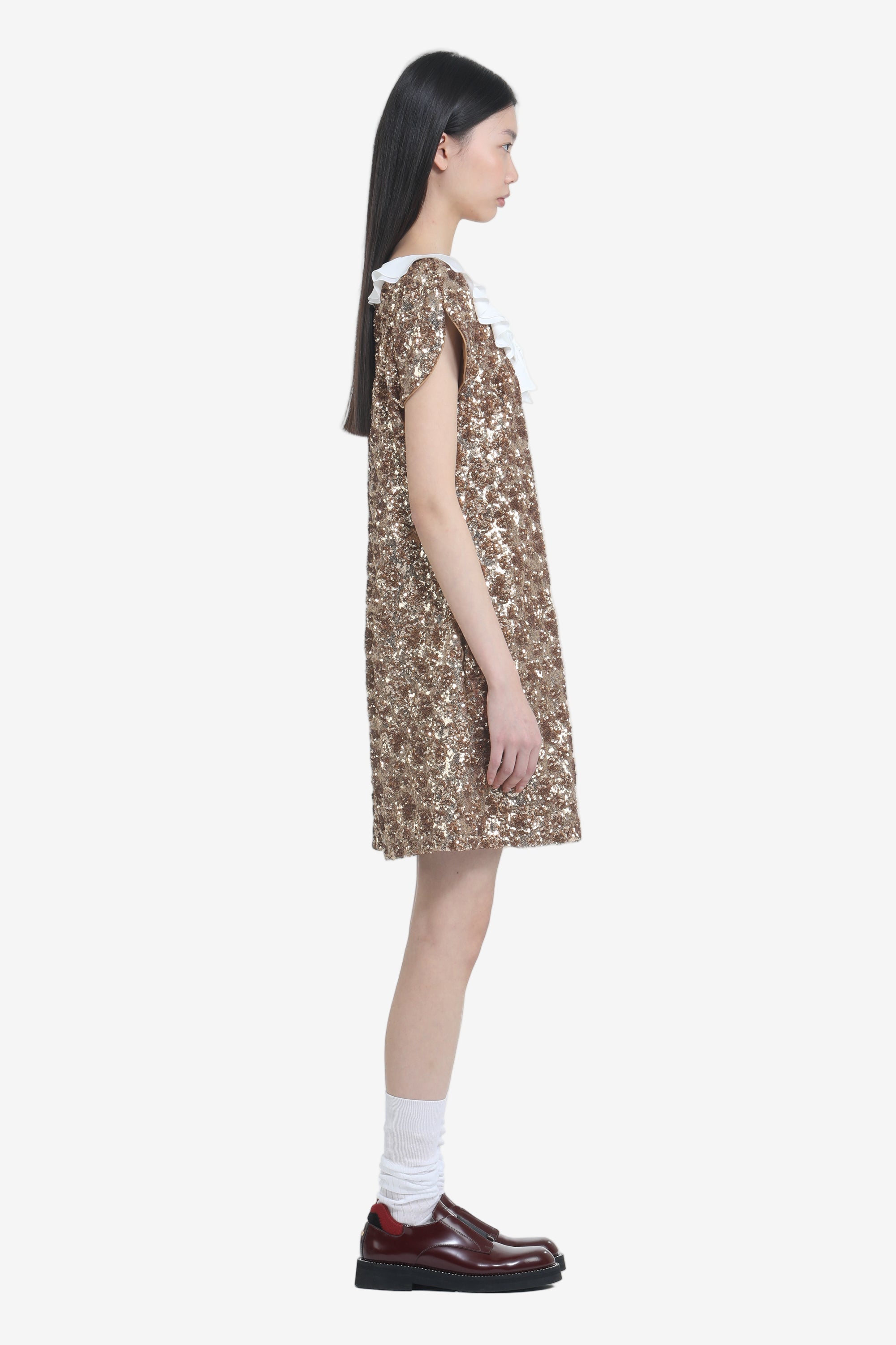 Short dress with gold embroidery and ruffled collar