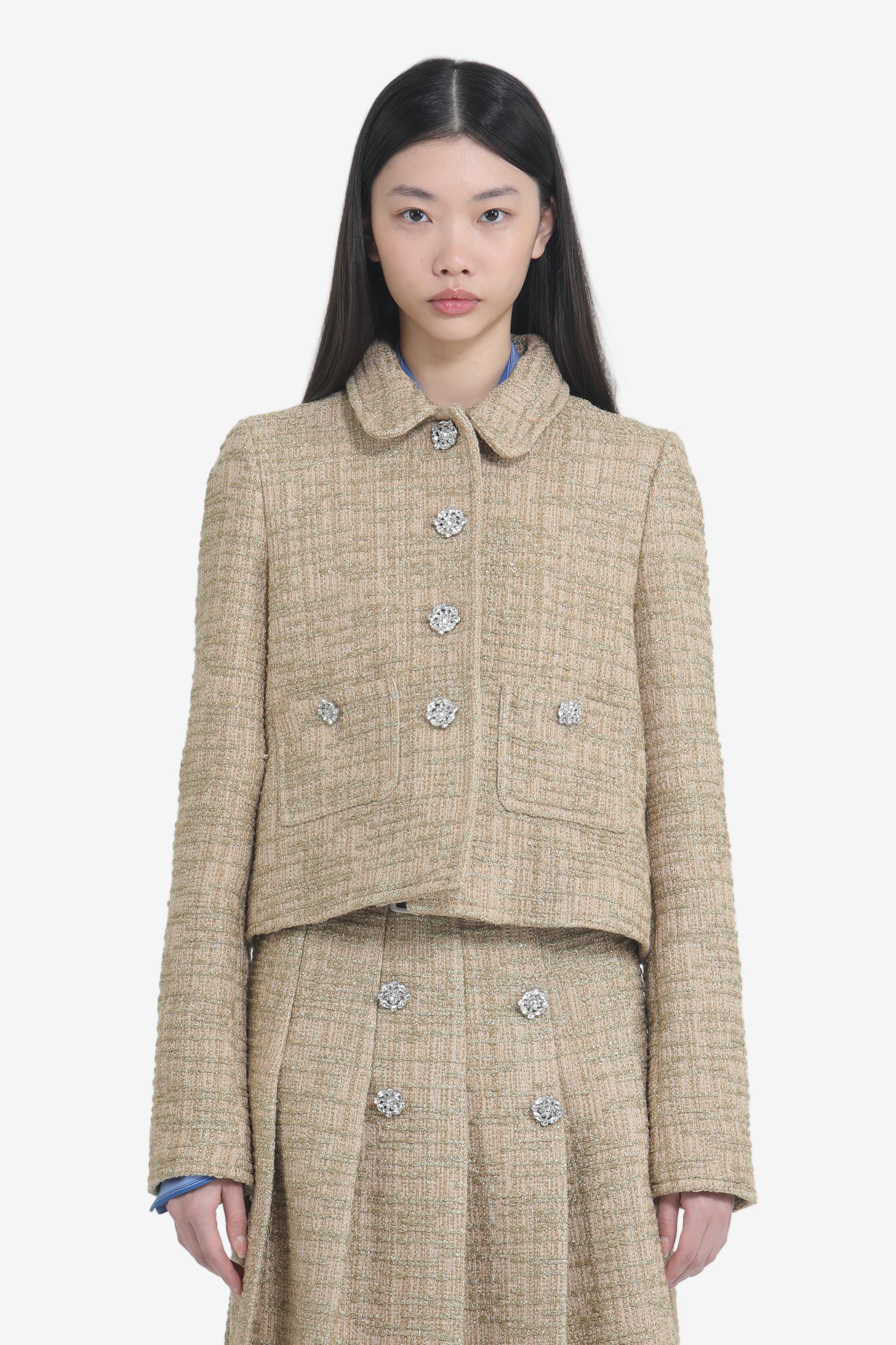 Short jacket with pockets and jewel buttons