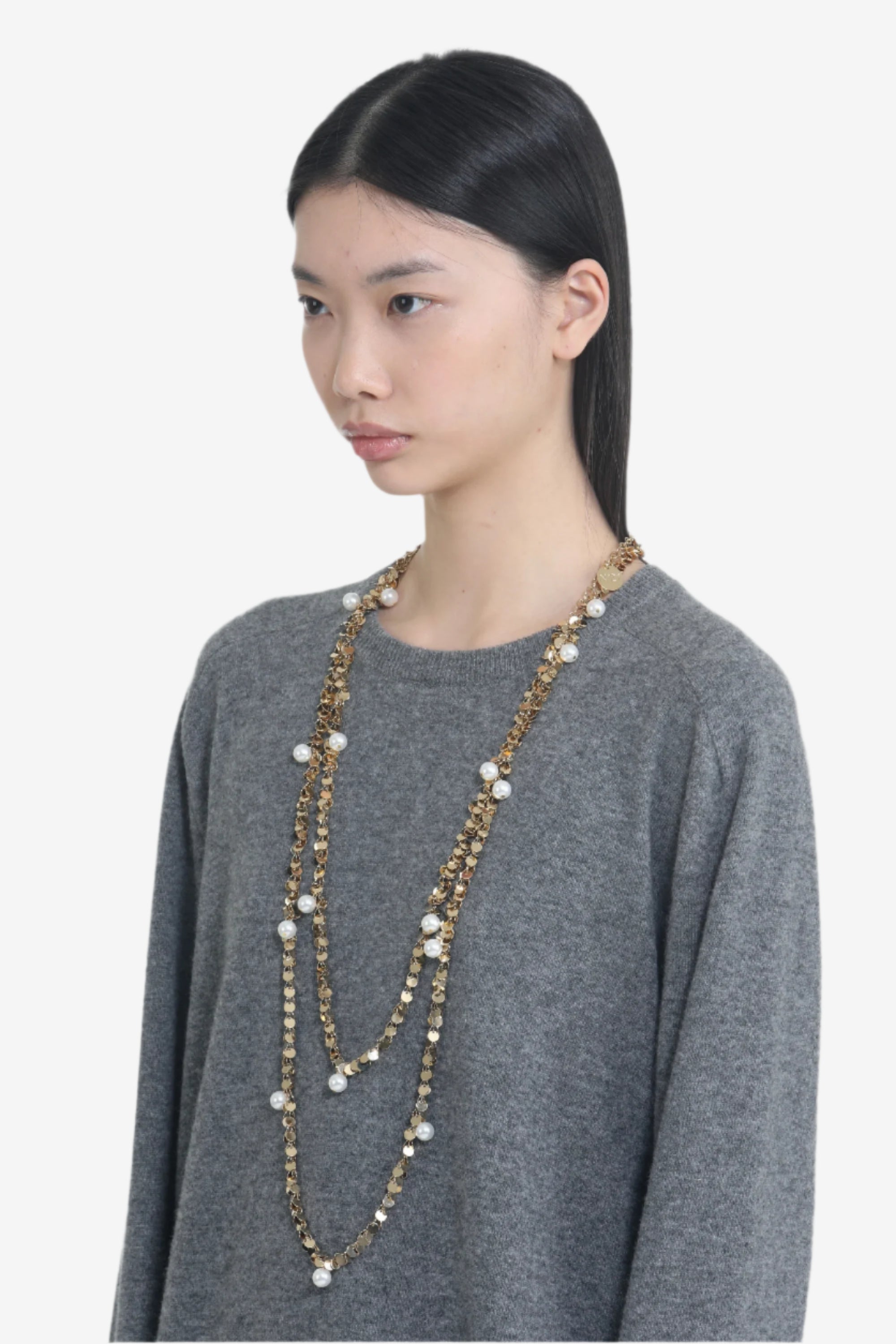 Collana con piccoli pendenti dorati