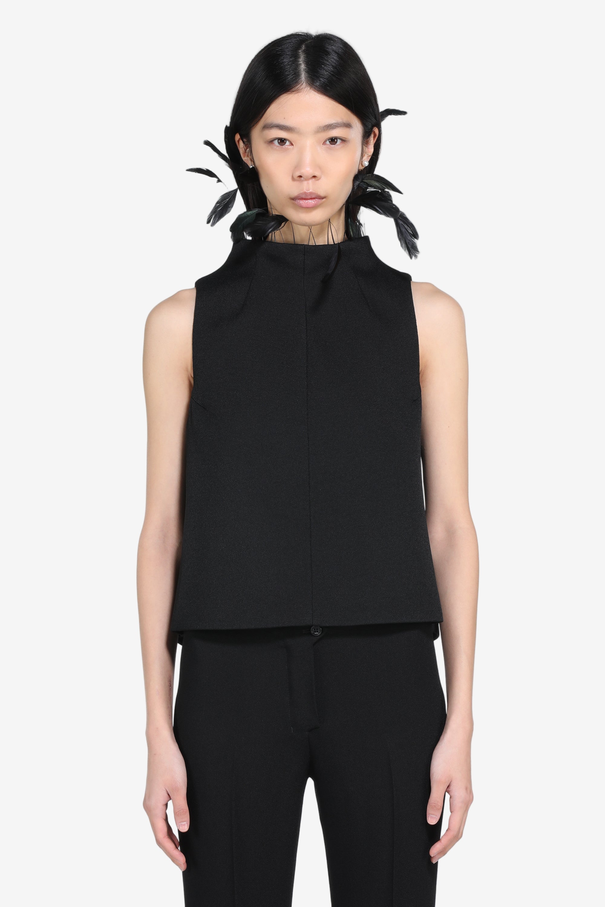 Sleeveless top with feathers