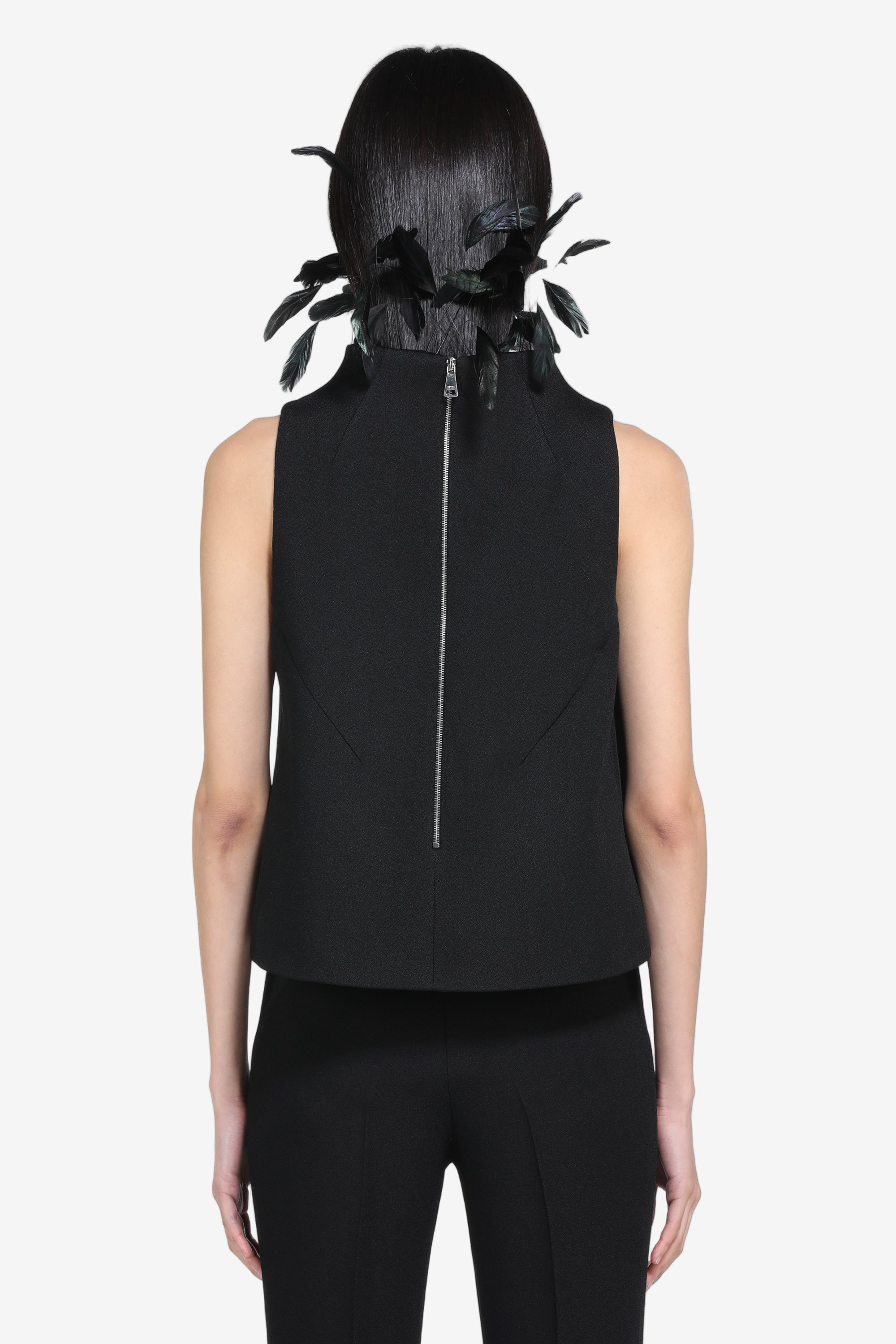 Sleeveless top with feathers