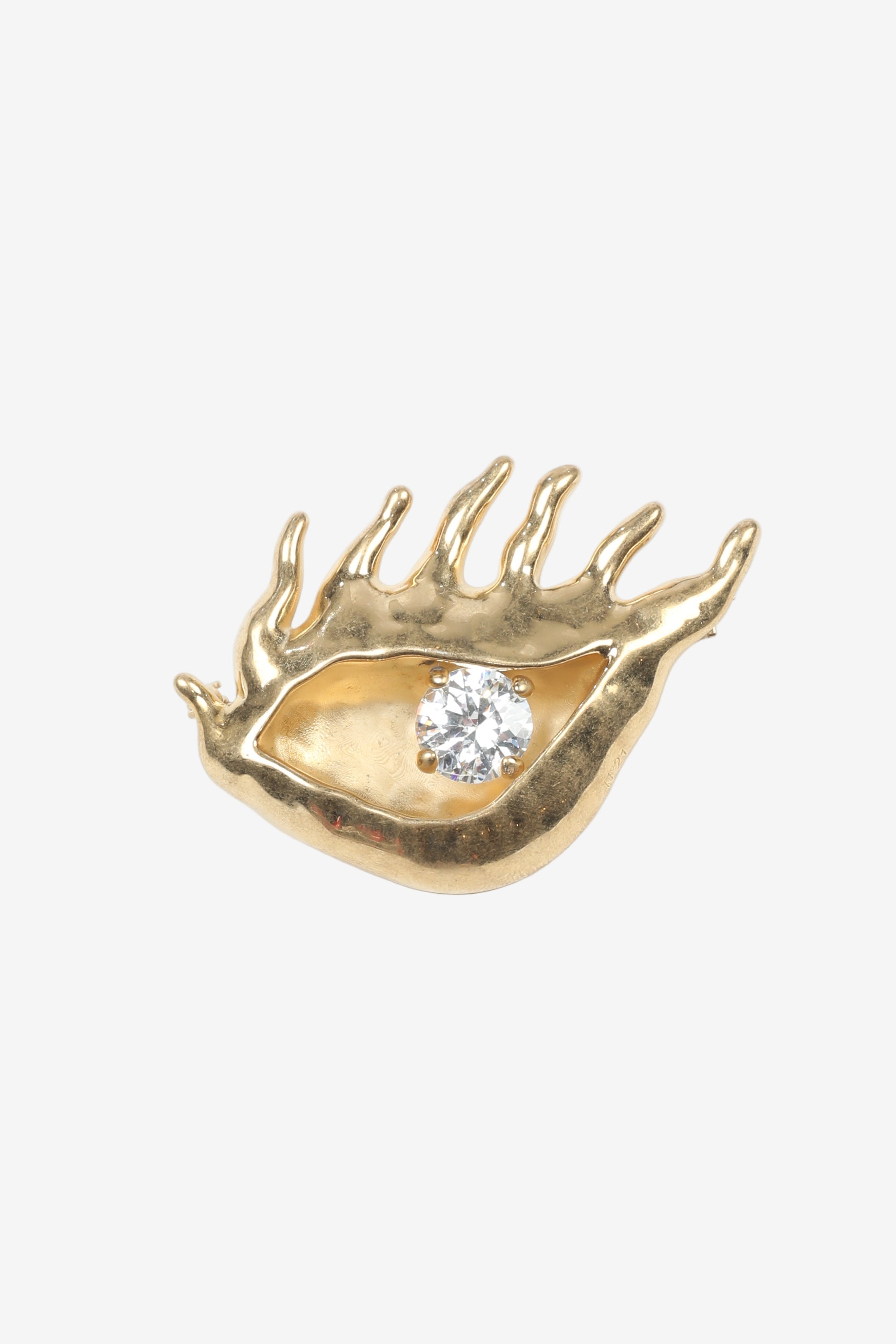 Golden eye-shaped brooch
