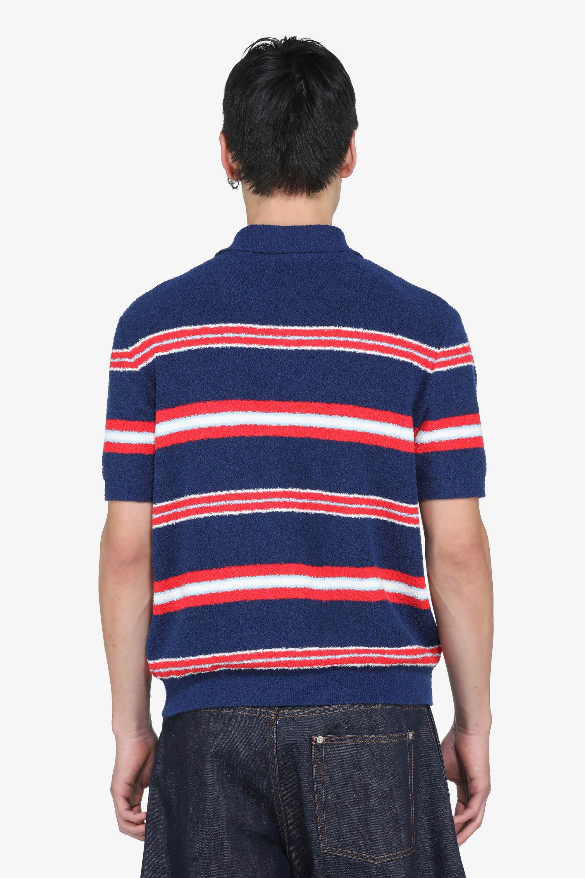 Polo a righe con logo