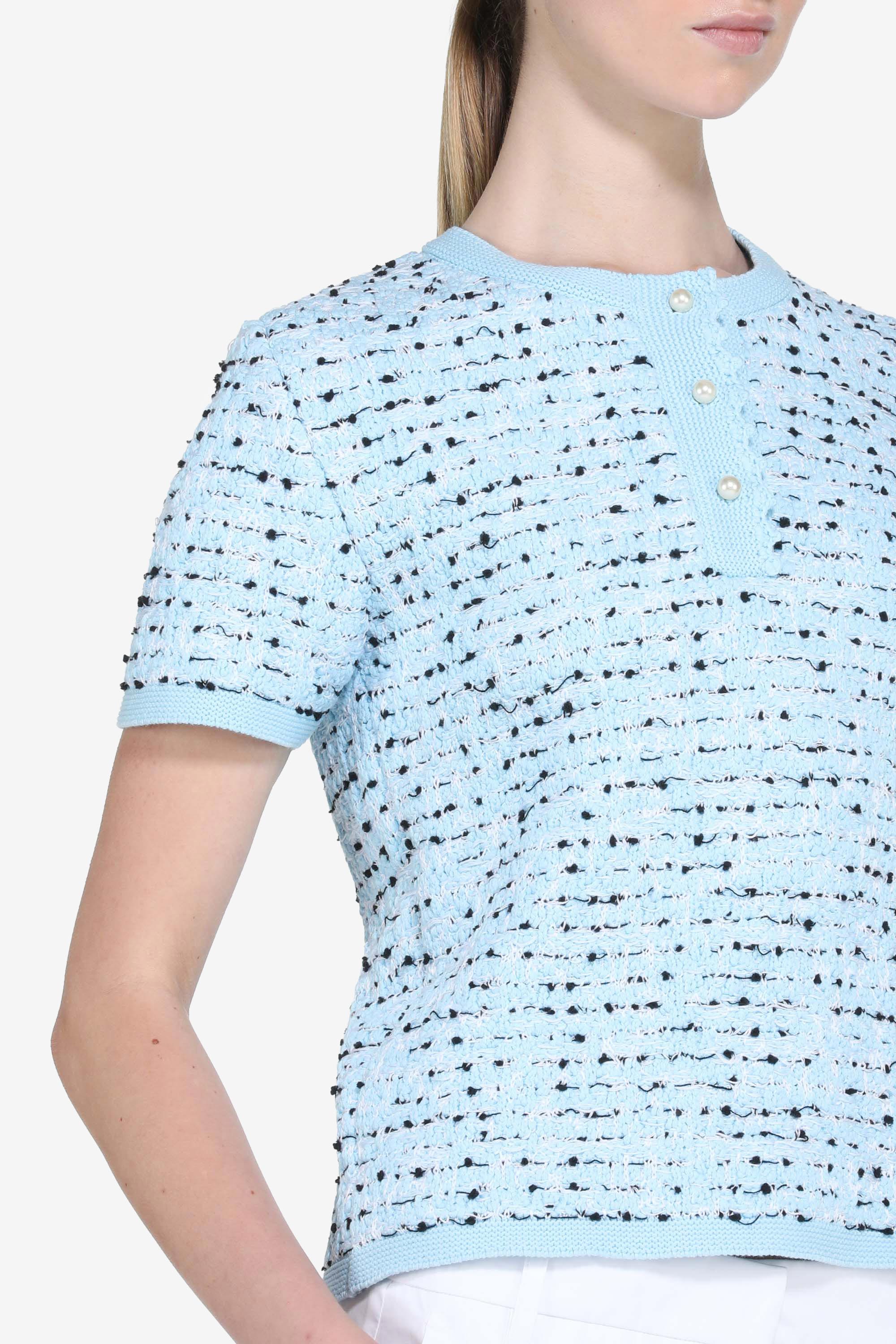 Short-sleeved sweater with pearl buttons