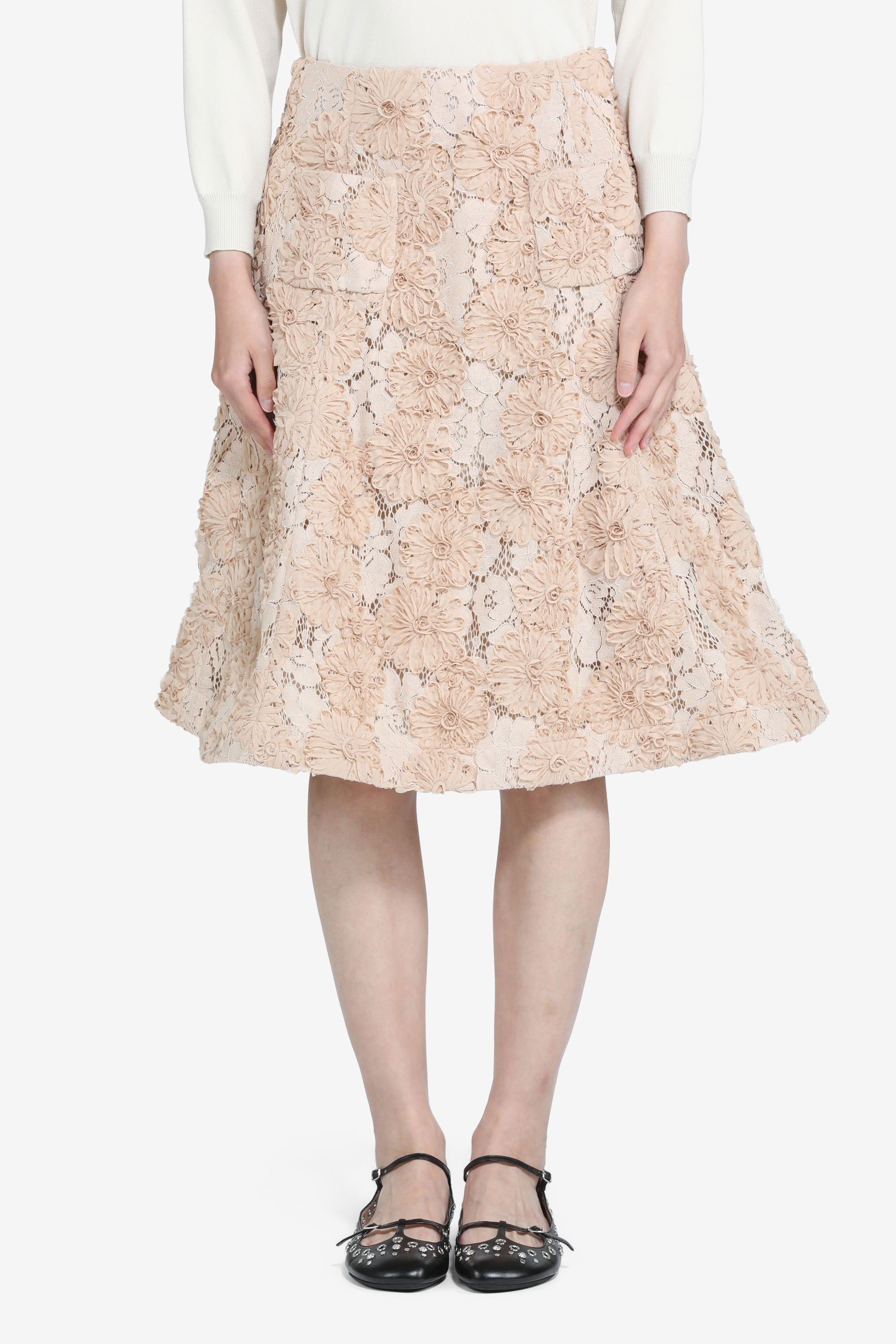 Knee-length lace skirt