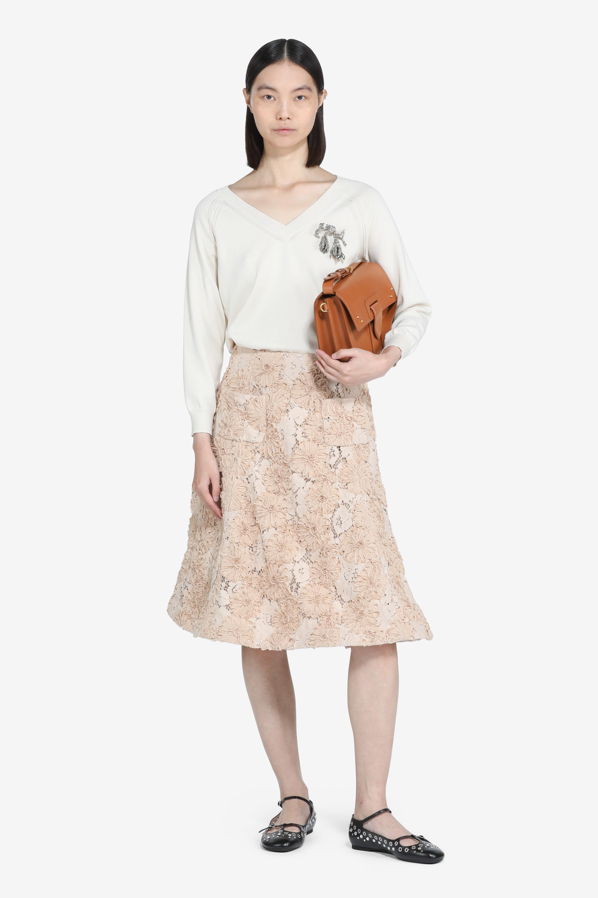 Knee-length lace skirt