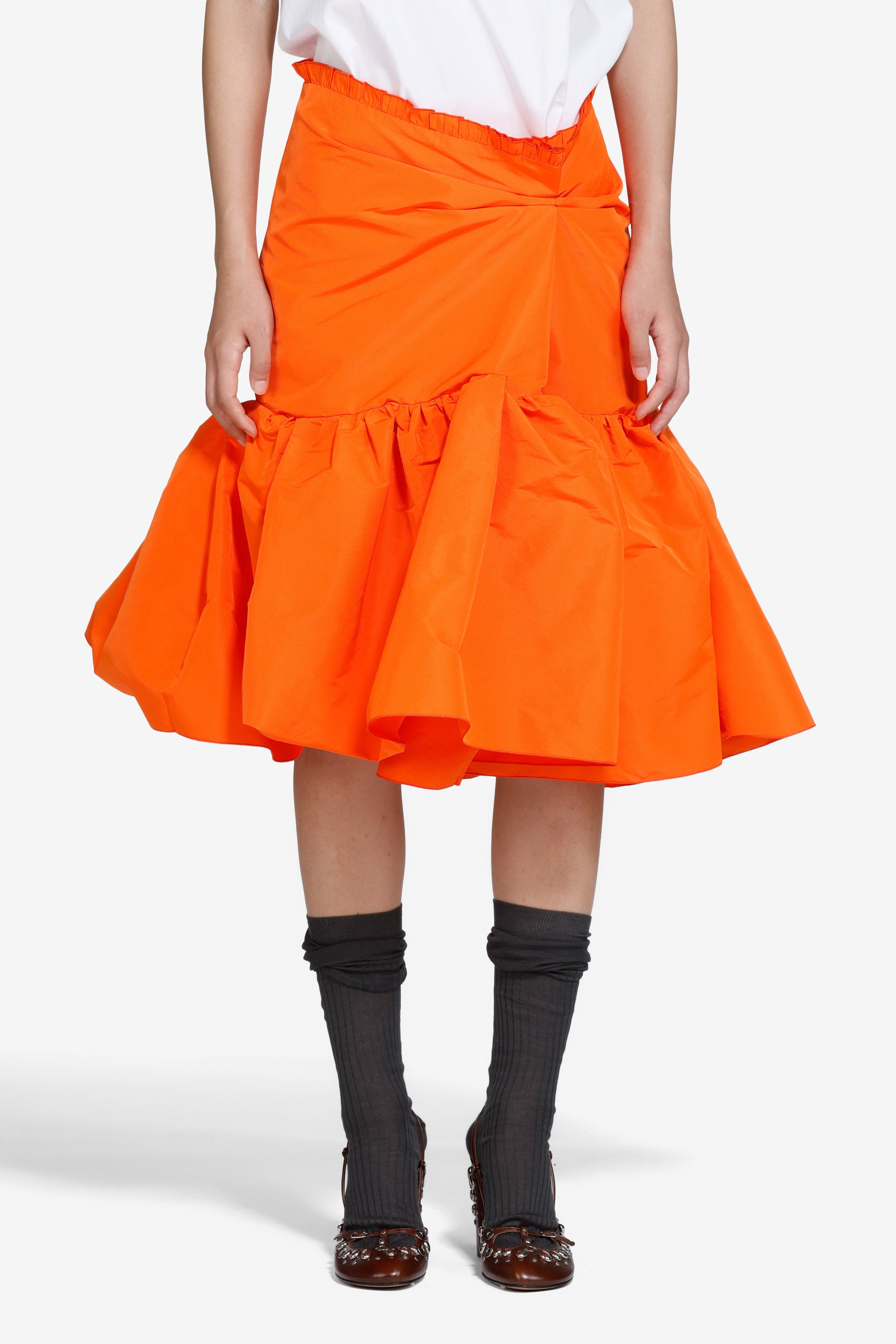 Gonna strutturata sotto il ginocchio