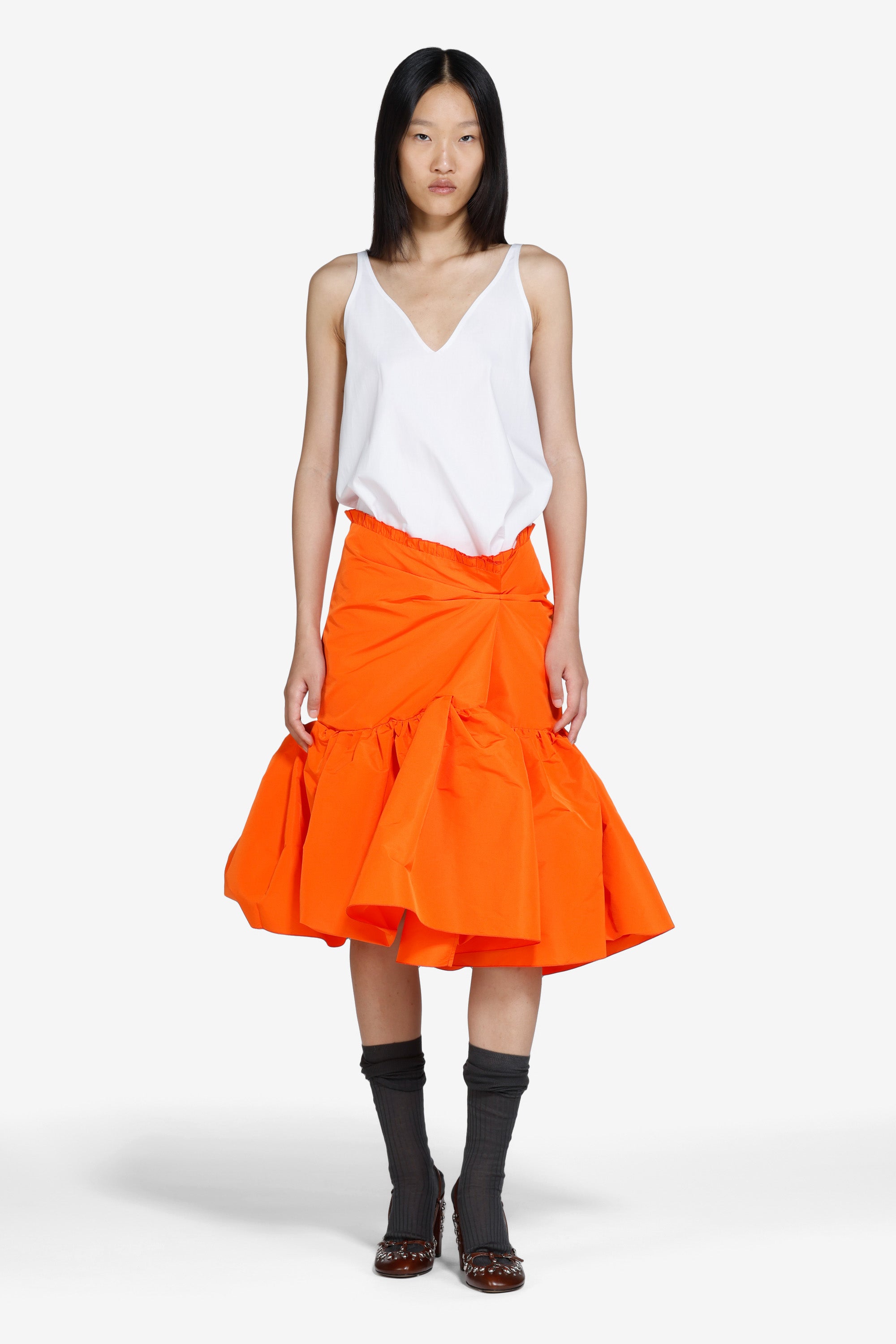 Gonna strutturata sotto il ginocchio