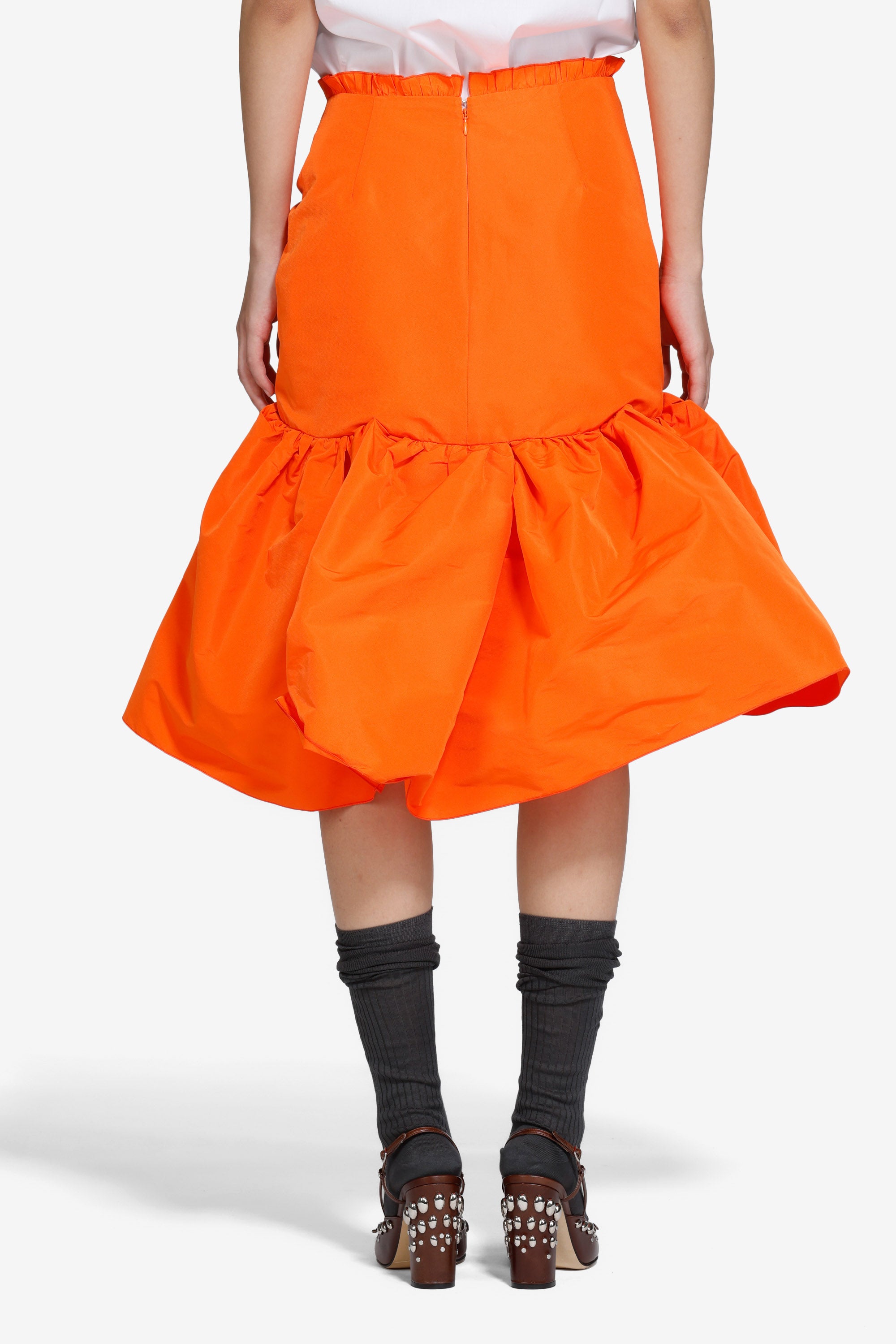 Gonna strutturata sotto il ginocchio