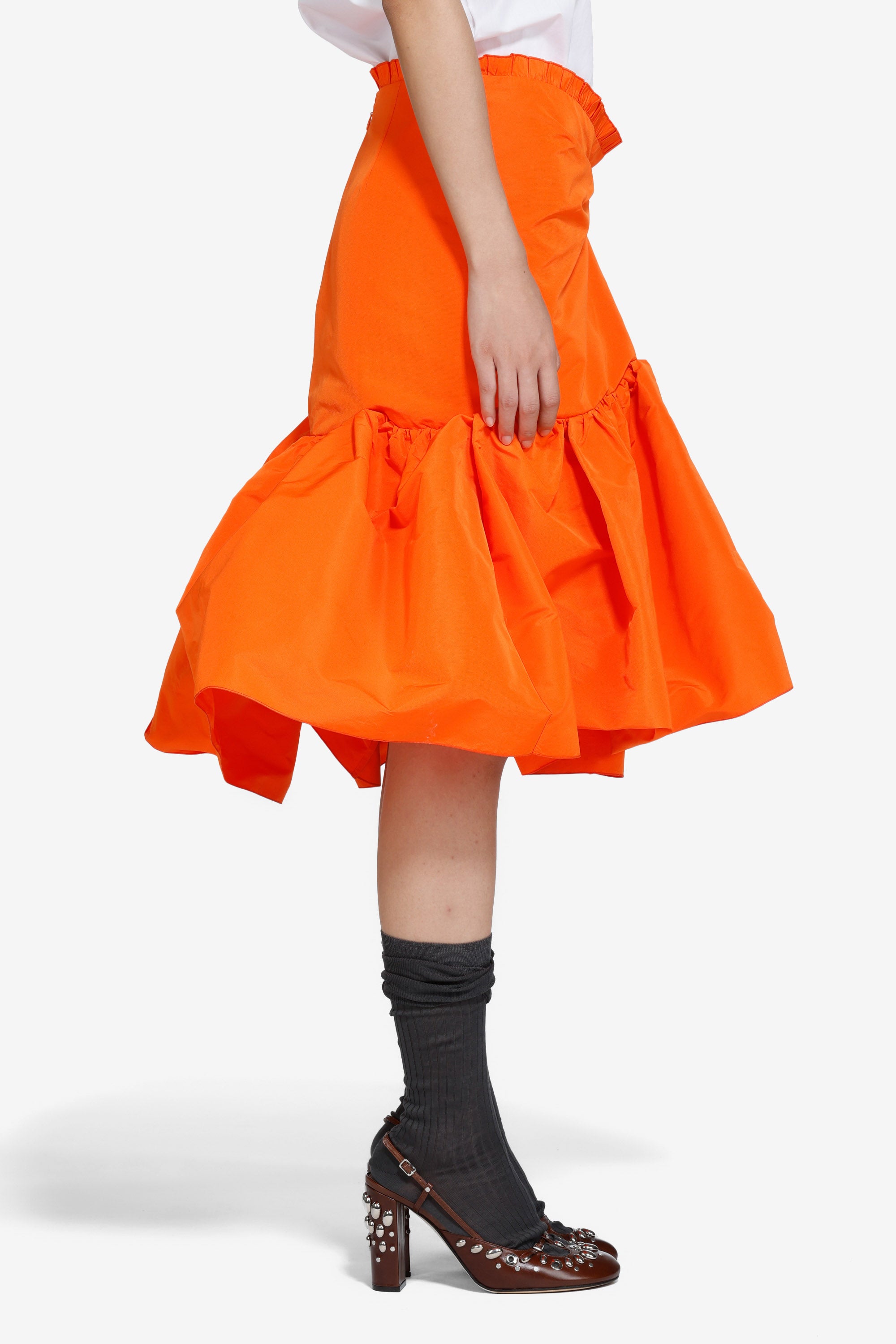 Gonna strutturata sotto il ginocchio