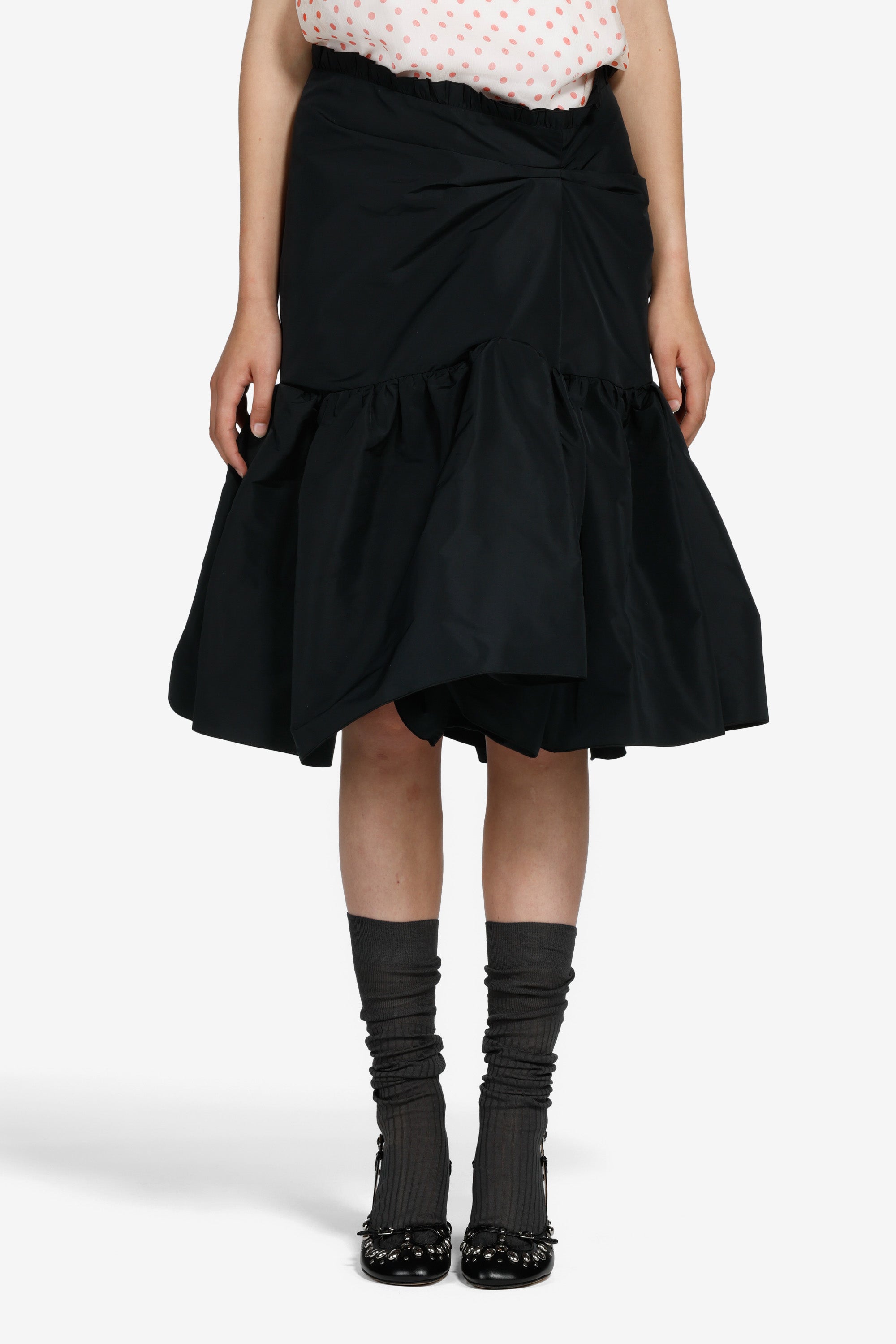 Gonna strutturata sotto il ginocchio