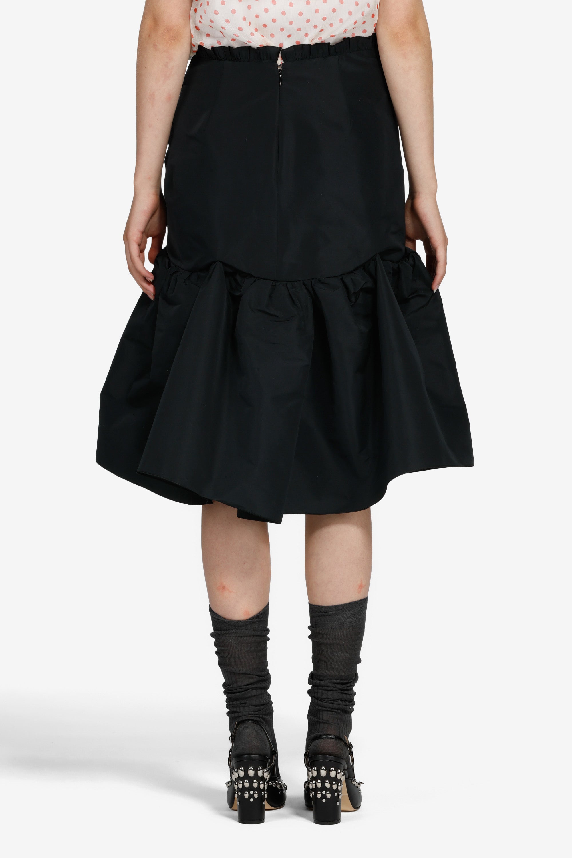 Gonna strutturata sotto il ginocchio