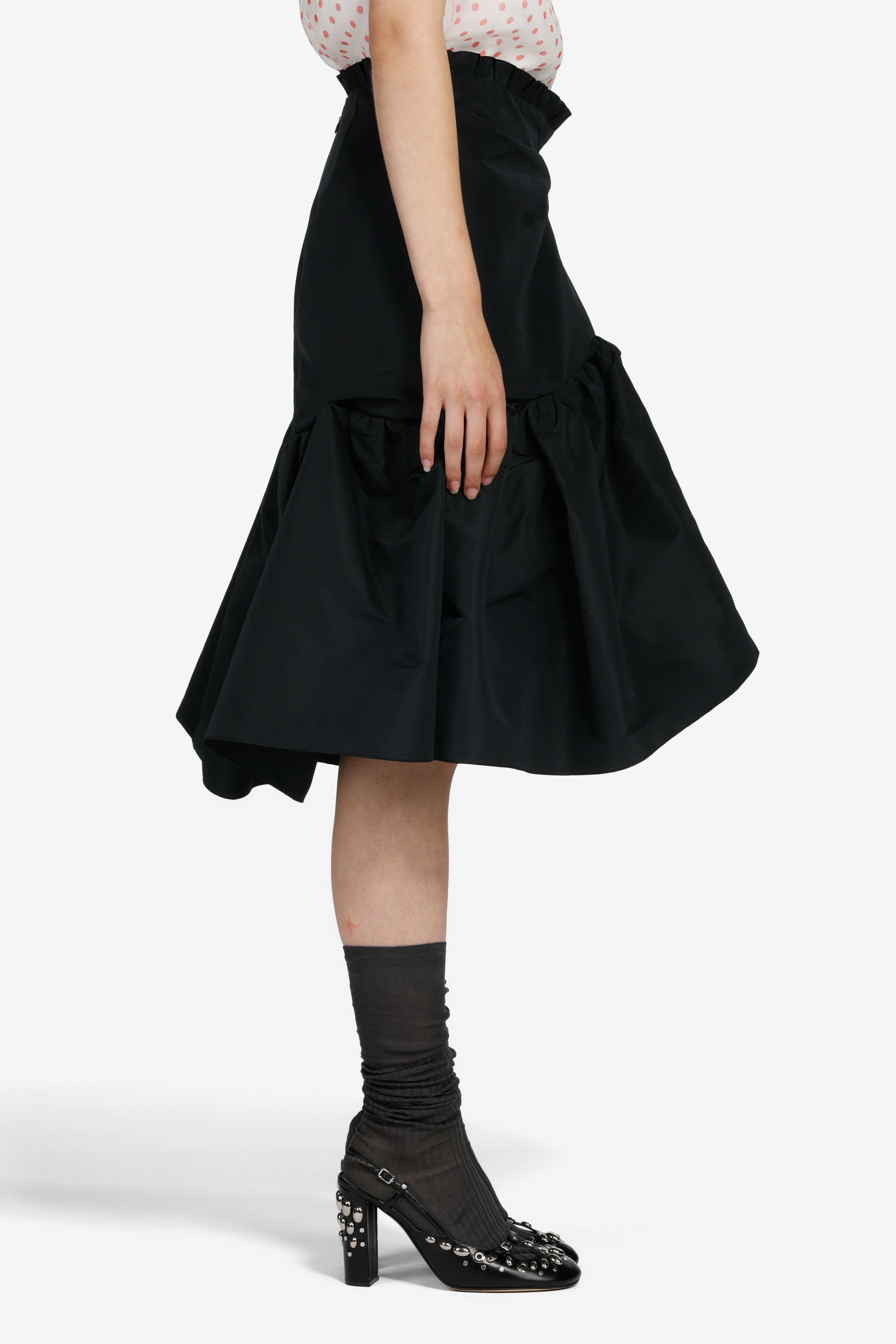 Gonna strutturata sotto il ginocchio