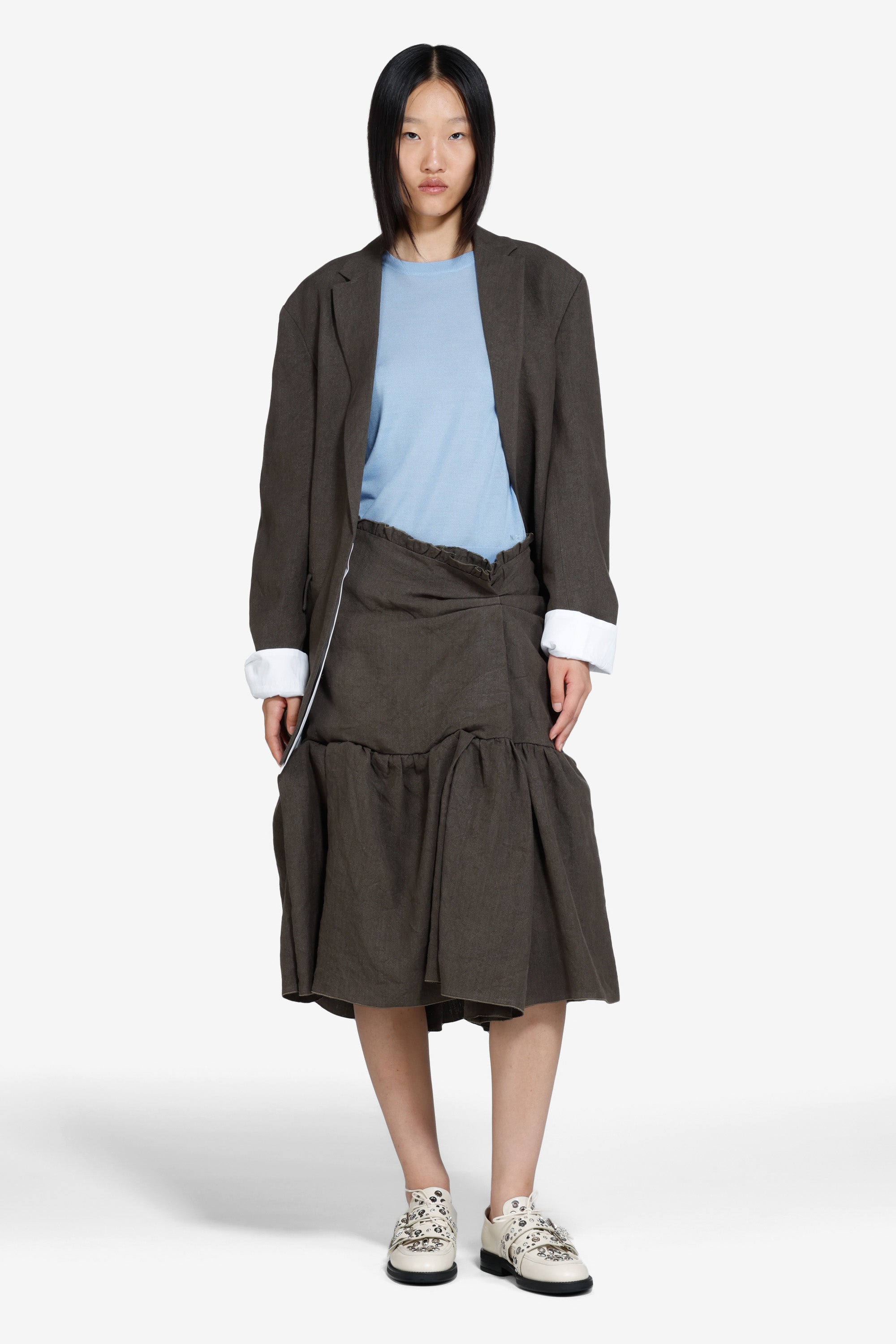 Gonna strutturata sotto il ginocchio