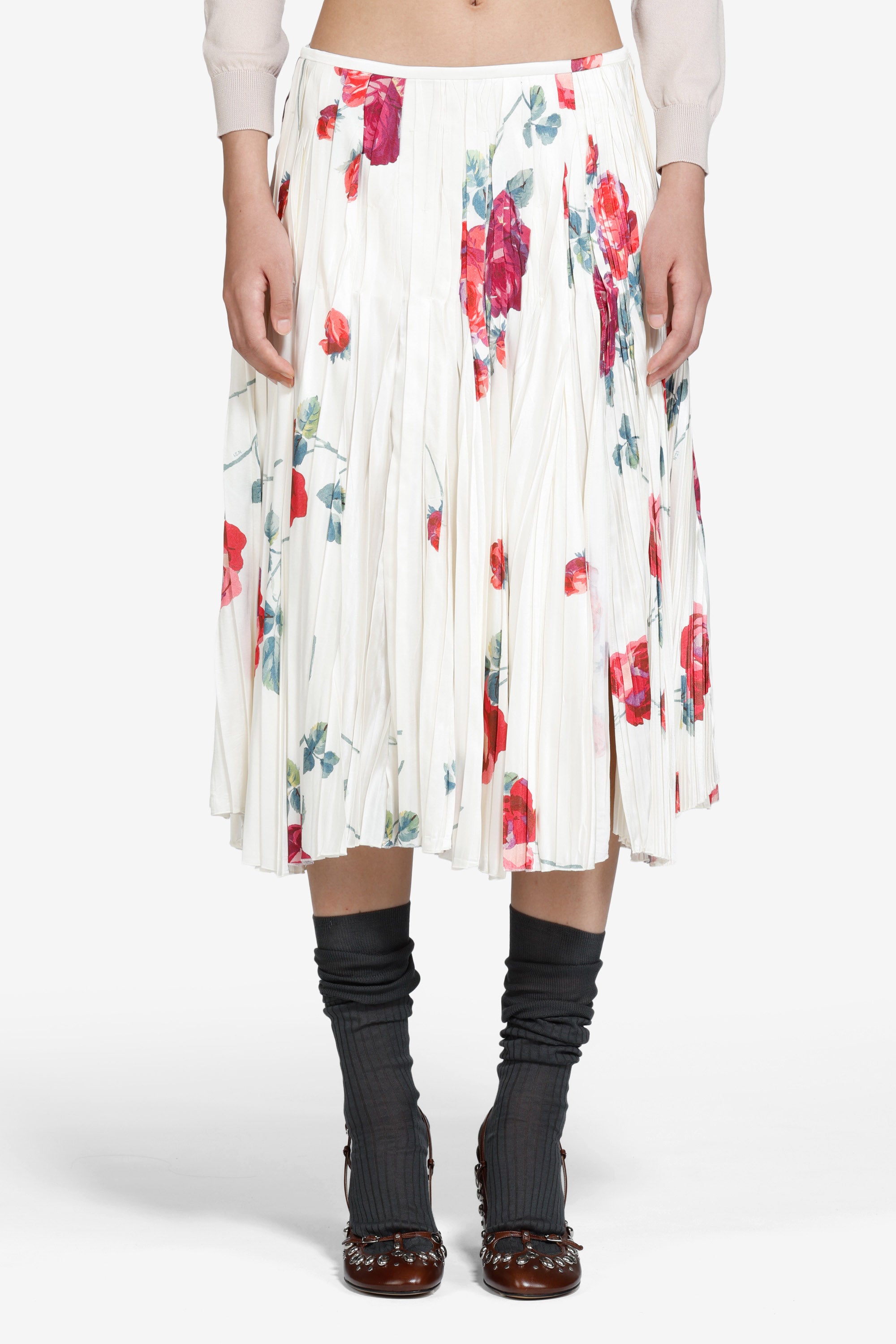 Gonna plissettata con stampa a rose