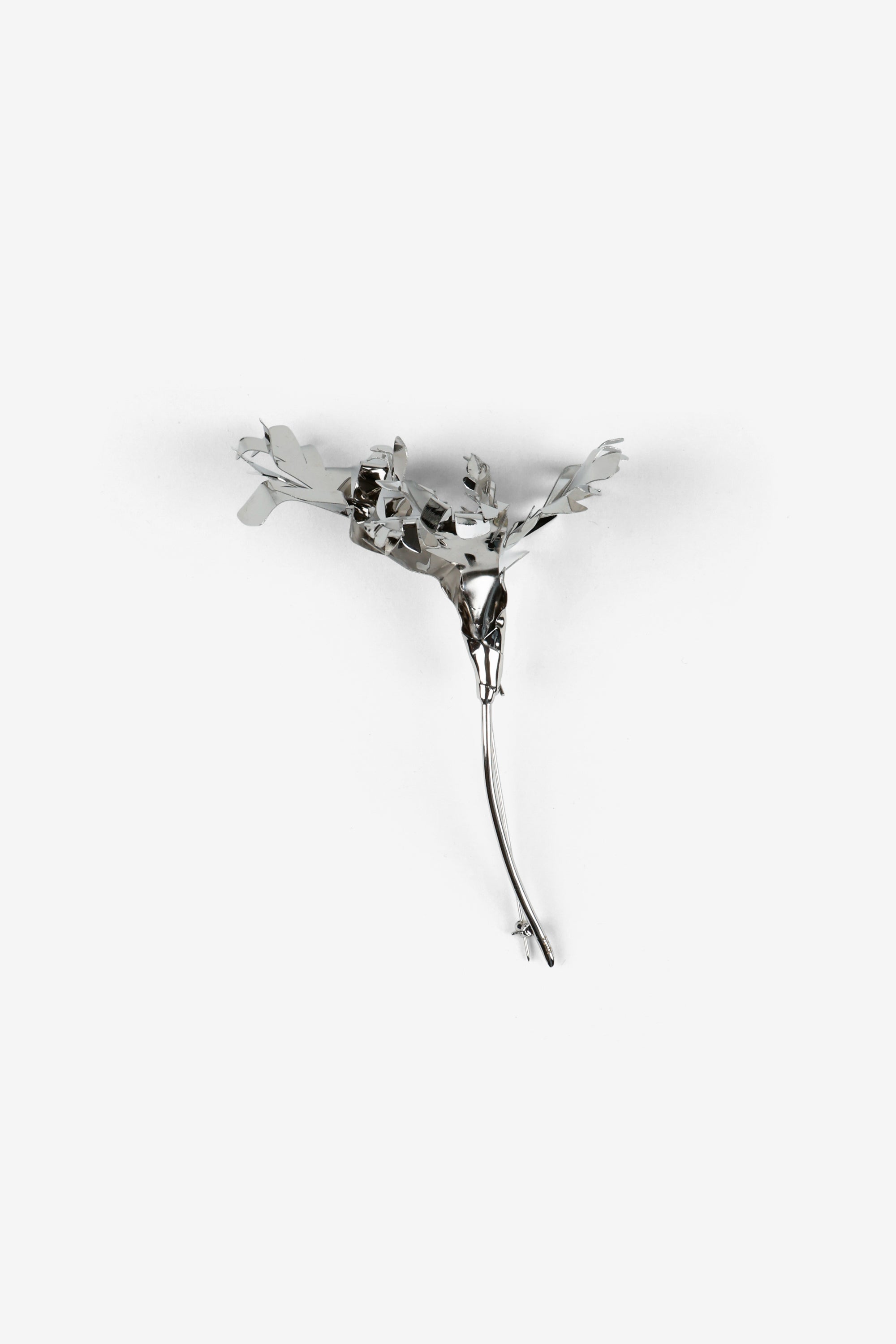 Metal flower brooch