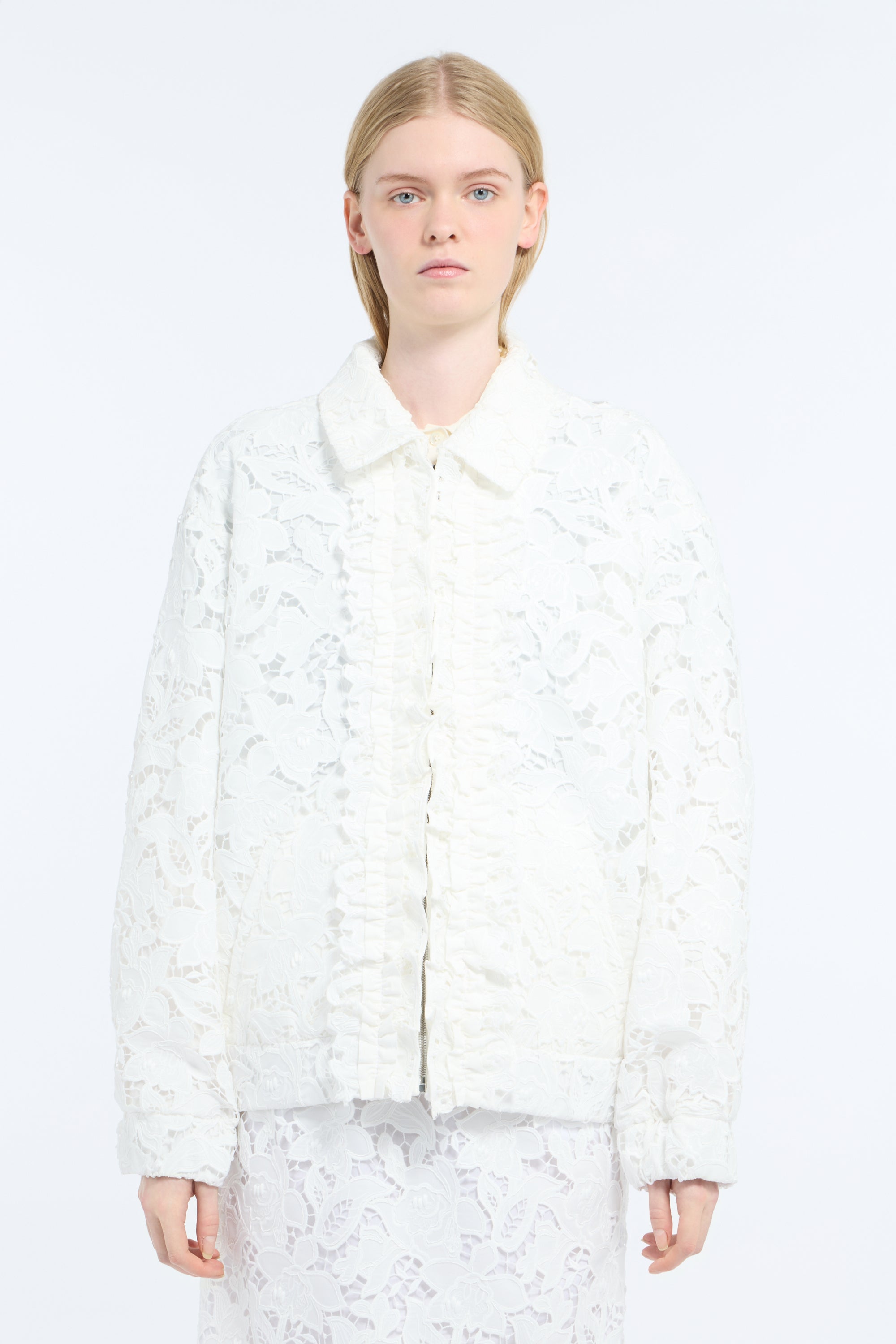 Bomber jacket with rebrodé Sangallo lace overlay