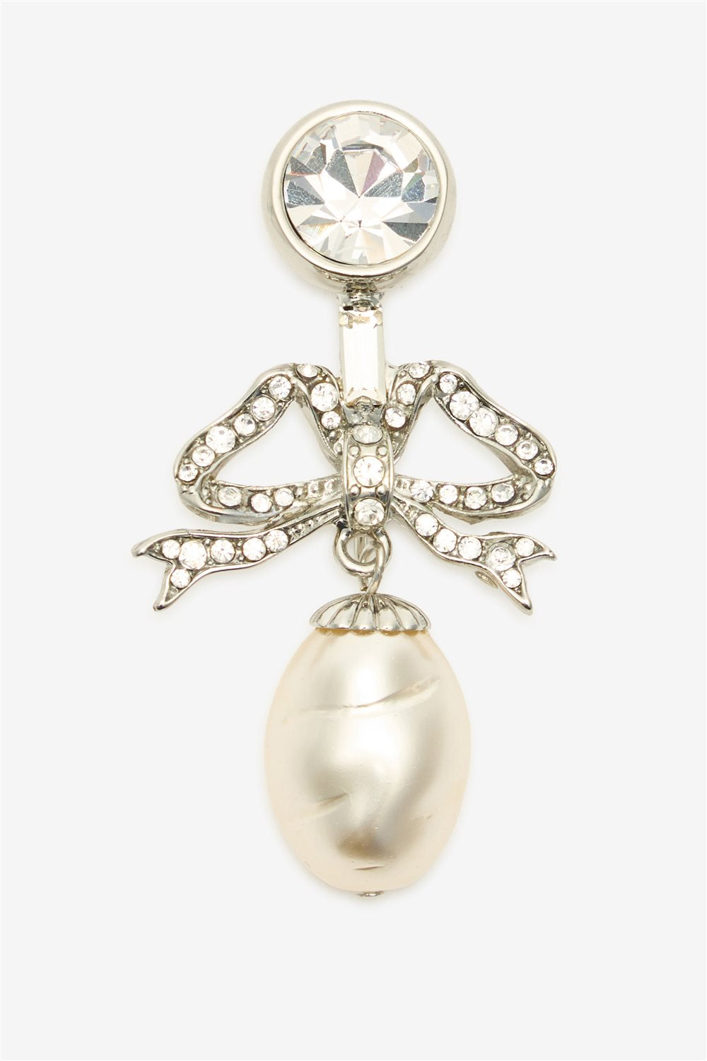 Metal brooch with crystals and pearl
