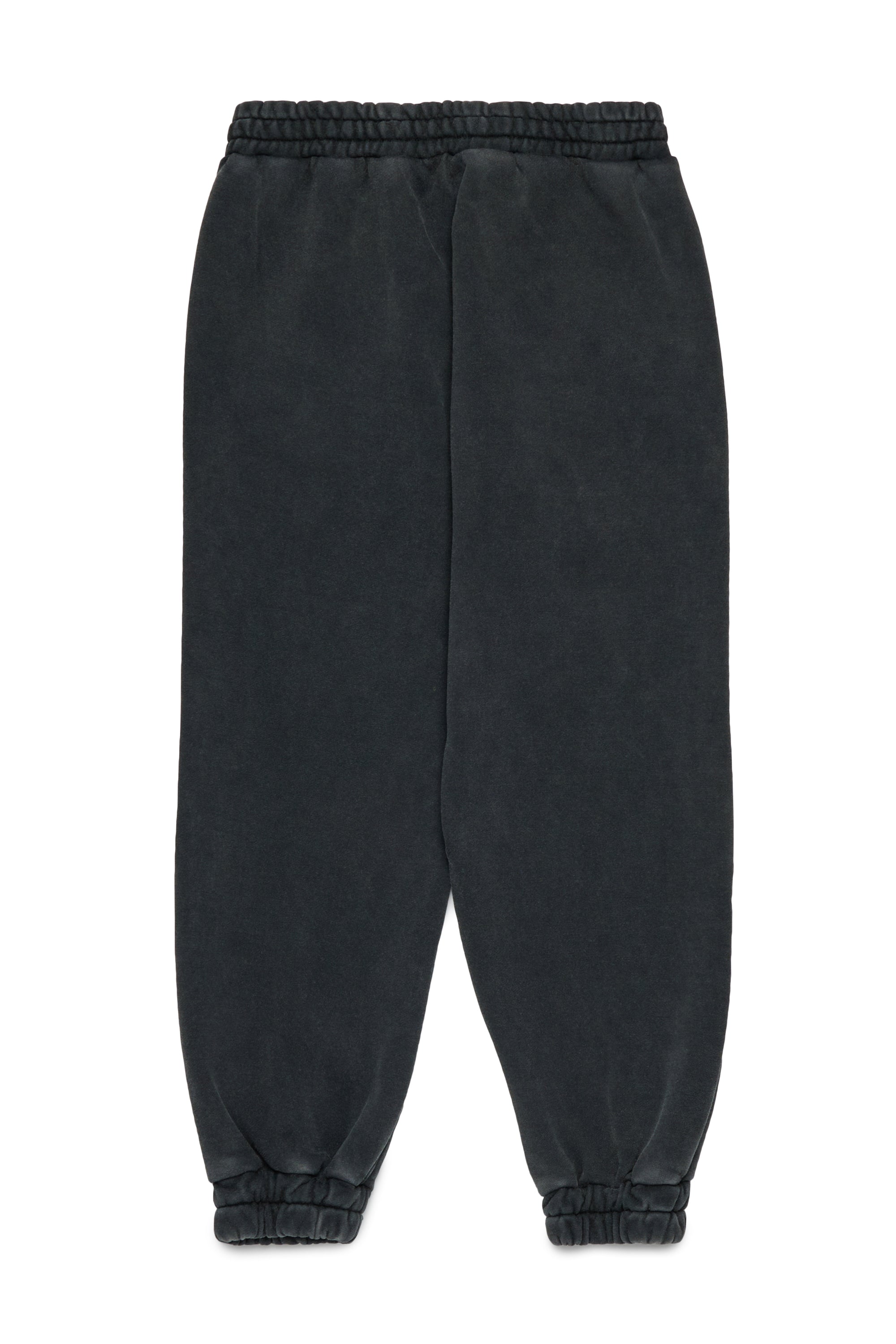 Jogger pants in sweatshirt with a worn effect