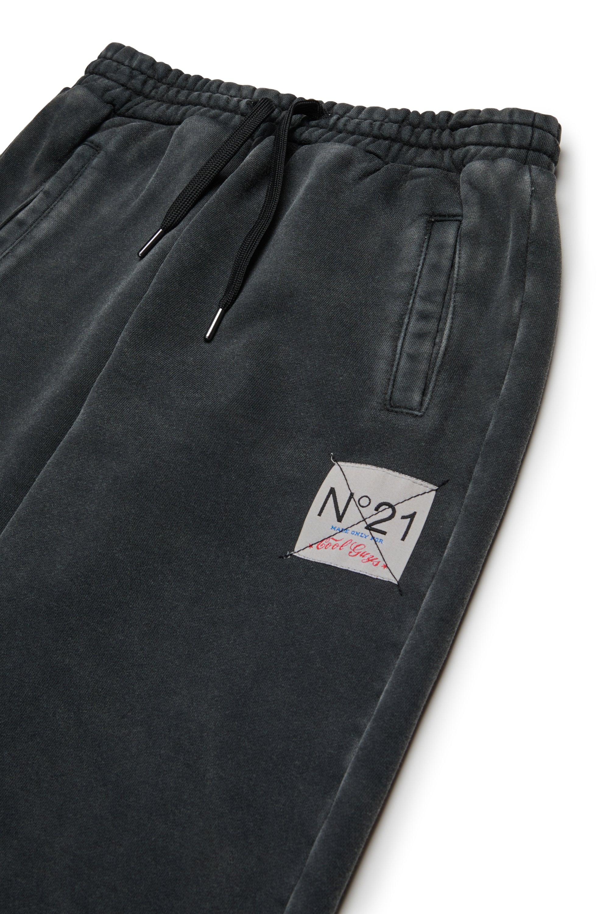 Jogger pants in sweatshirt with a worn effect
