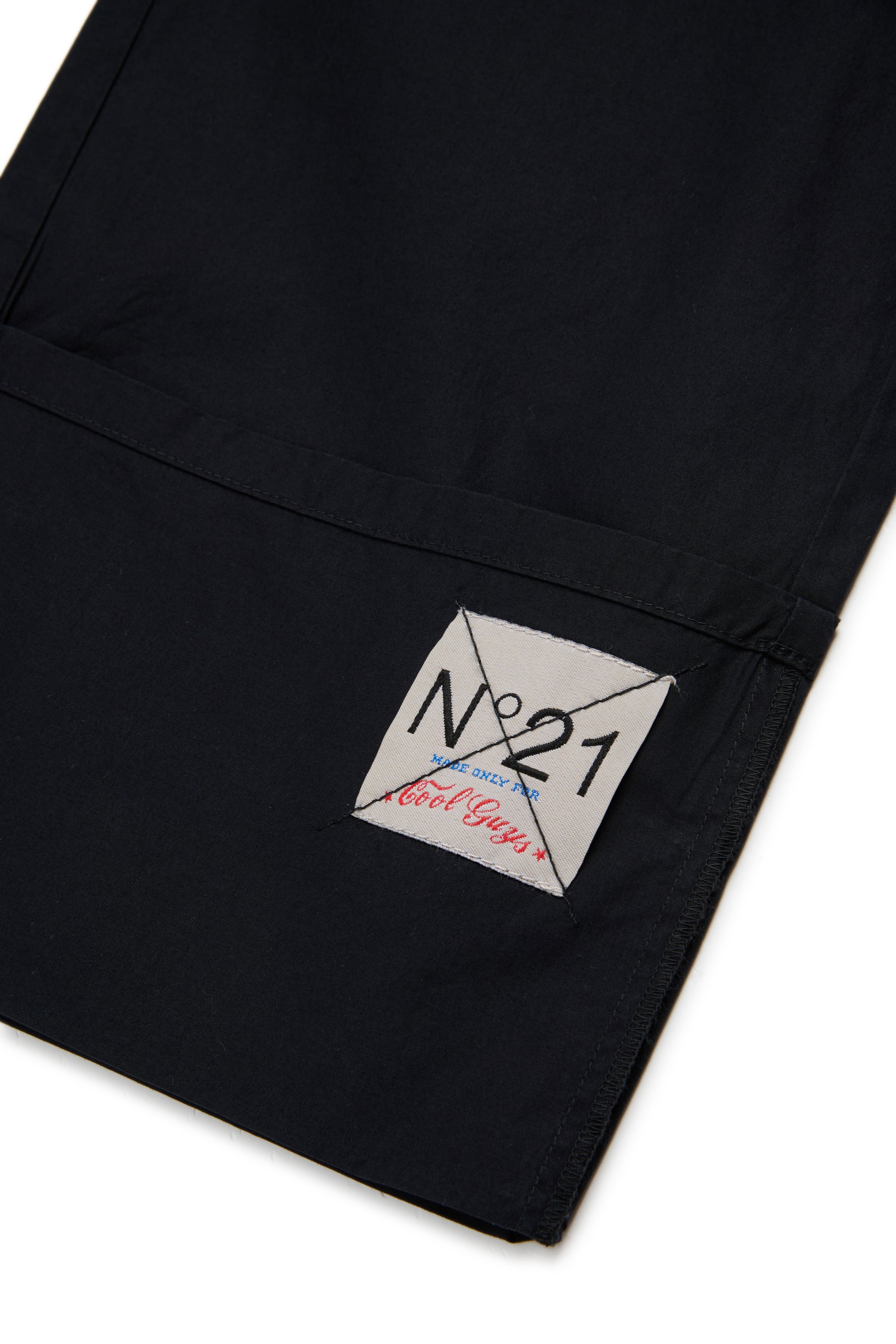 Long trousers with pleats